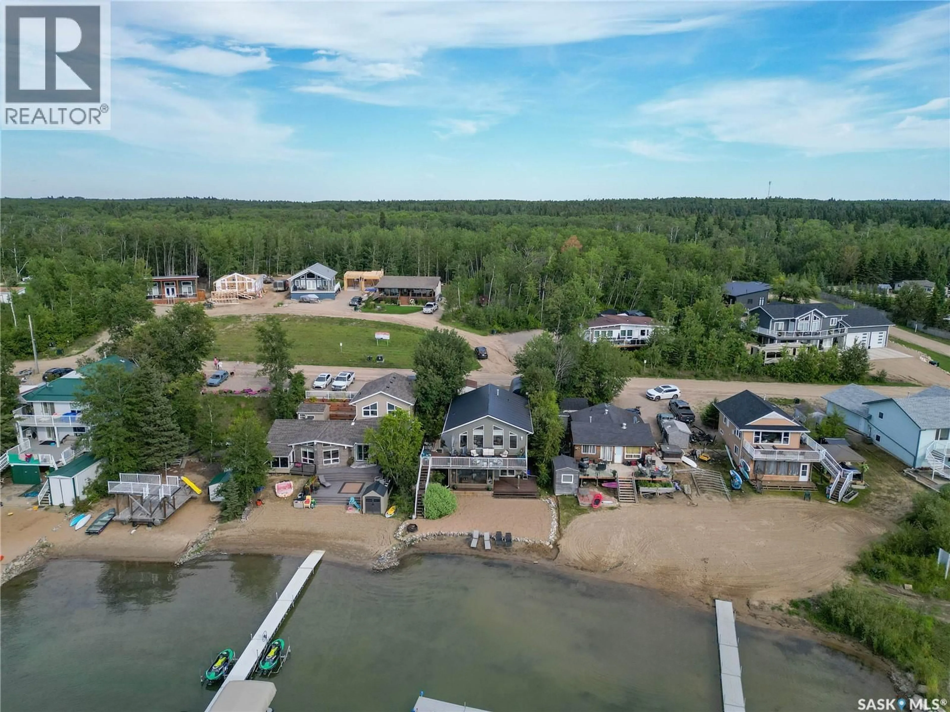 A pic from outside/outdoor area/front of a property/back of a property/a pic from drone, water/lake/river/ocean view for 108 JACOBSON DRIVE, Christopher Lake Saskatchewan S0J0N0