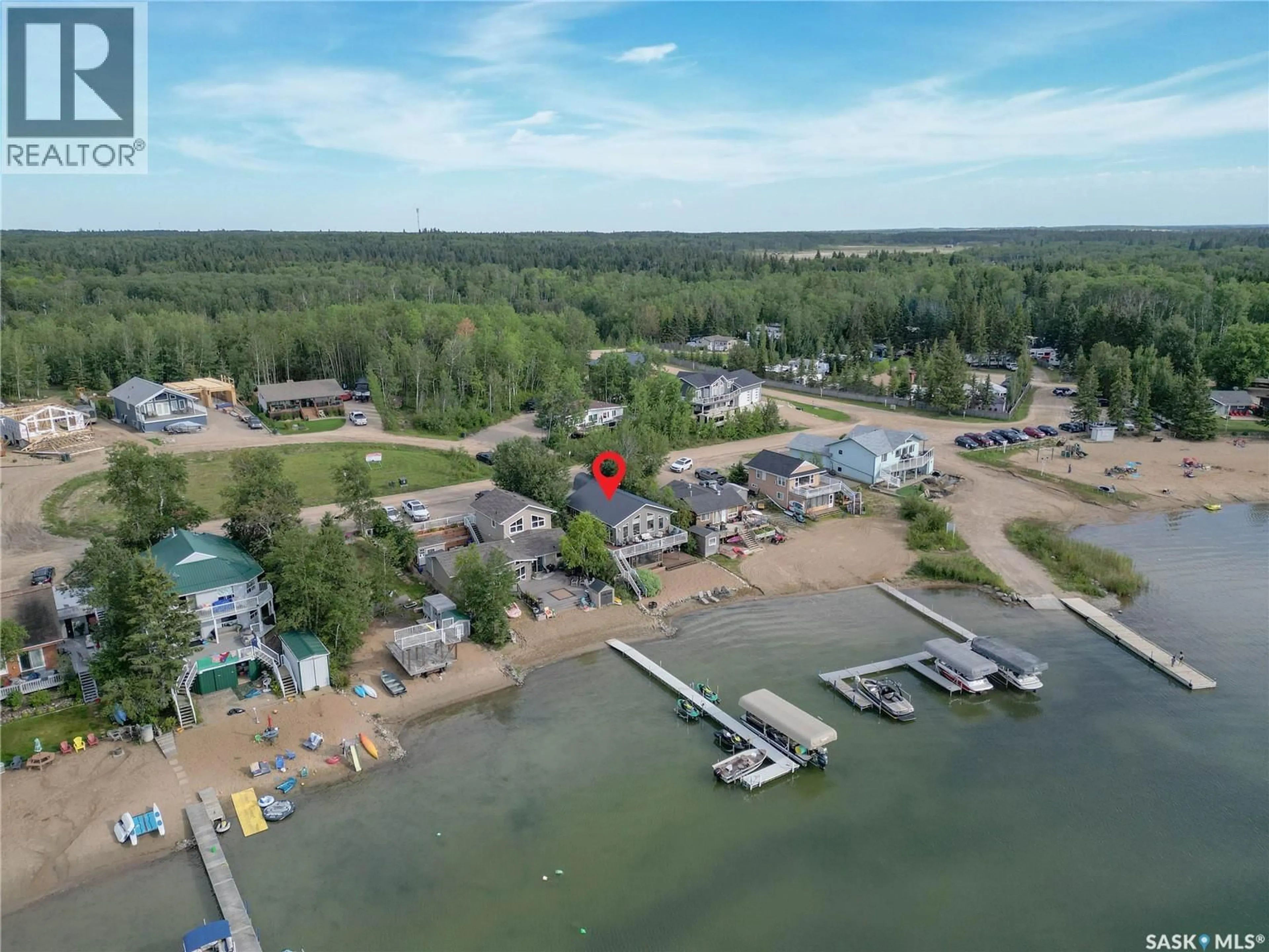 A pic from outside/outdoor area/front of a property/back of a property/a pic from drone, water/lake/river/ocean view for 108 JACOBSON DRIVE, Christopher Lake Saskatchewan S0J0N0