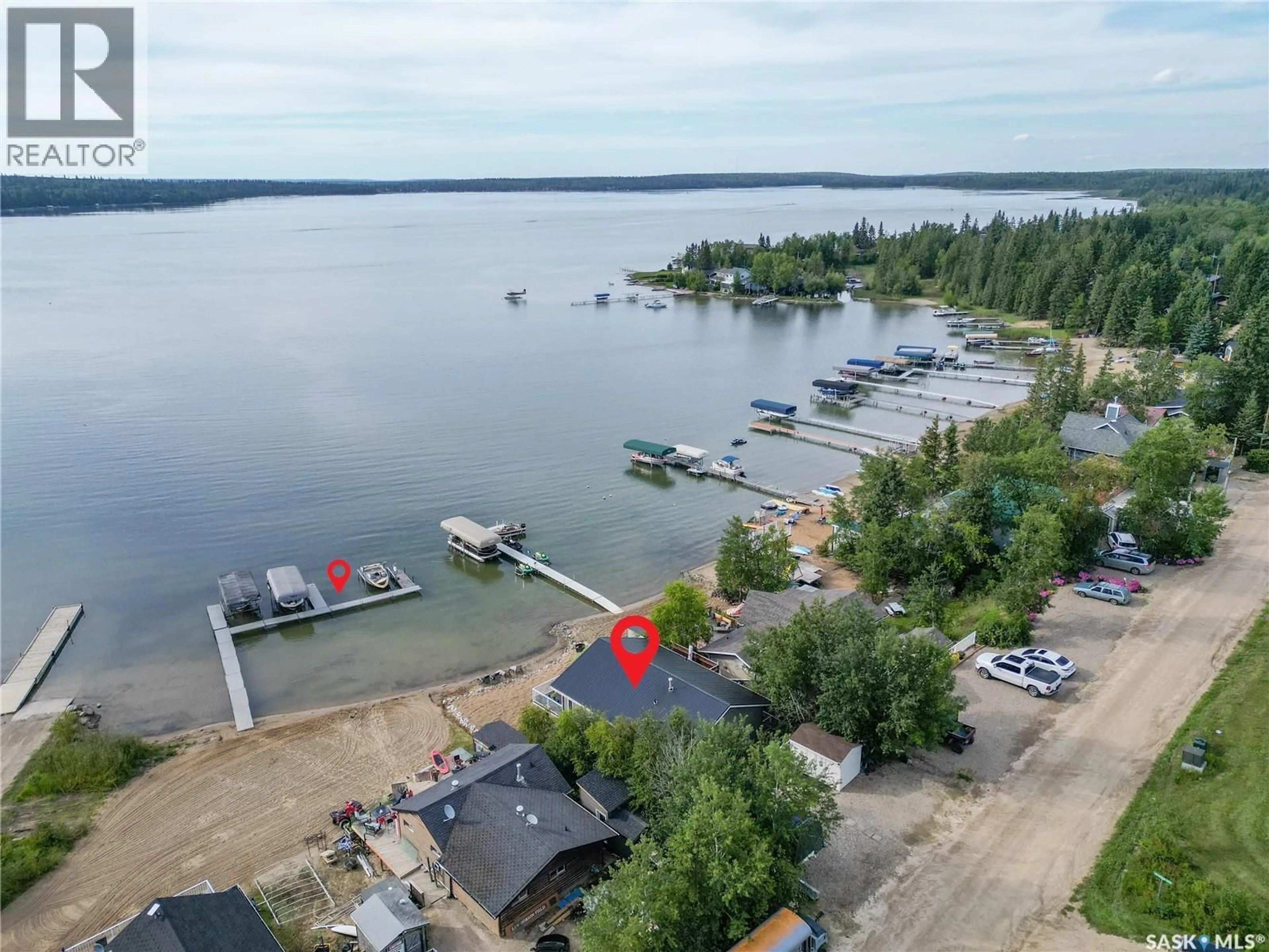 A pic from outside/outdoor area/front of a property/back of a property/a pic from drone, water/lake/river/ocean view for 108 JACOBSON DRIVE, Christopher Lake Saskatchewan S0J0N0
