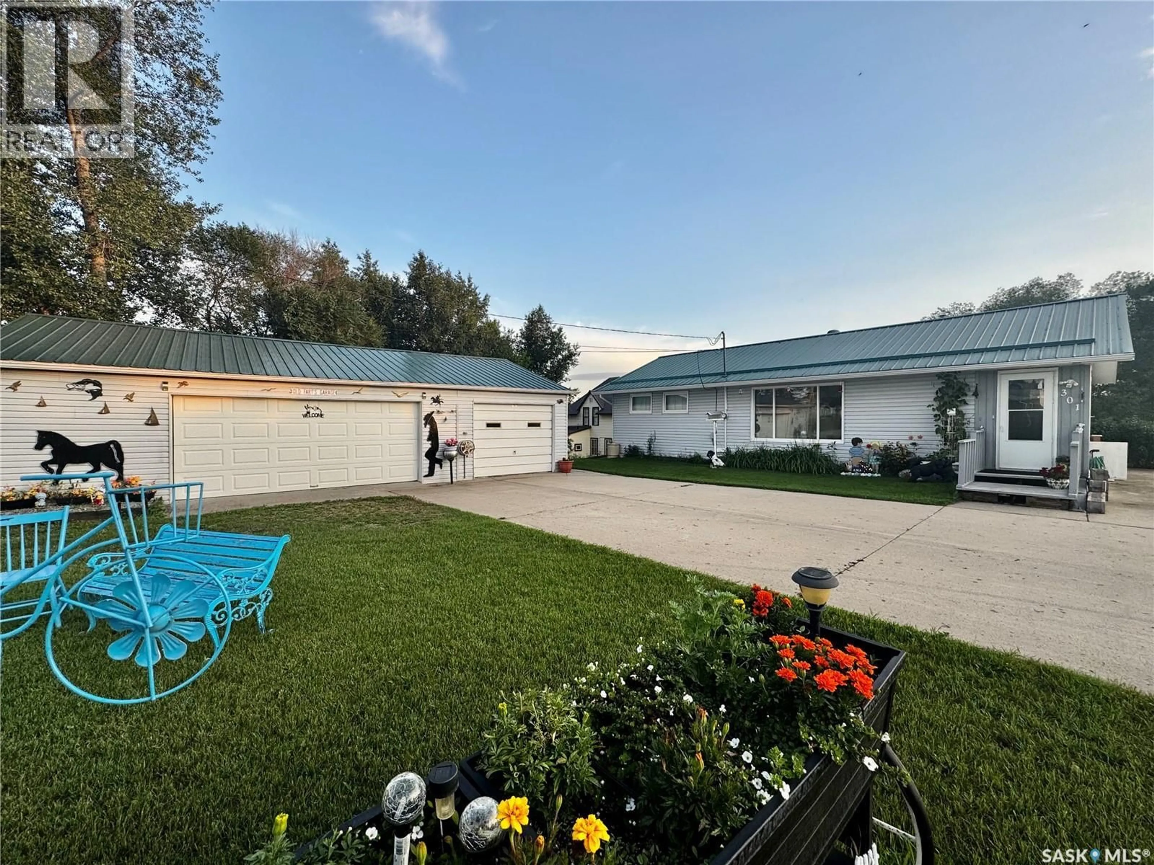 A pic from outside/outdoor area/front of a property/back of a property/a pic from drone, street for SE - 301 1ST STREET, Sturgis Saskatchewan S0A4A0