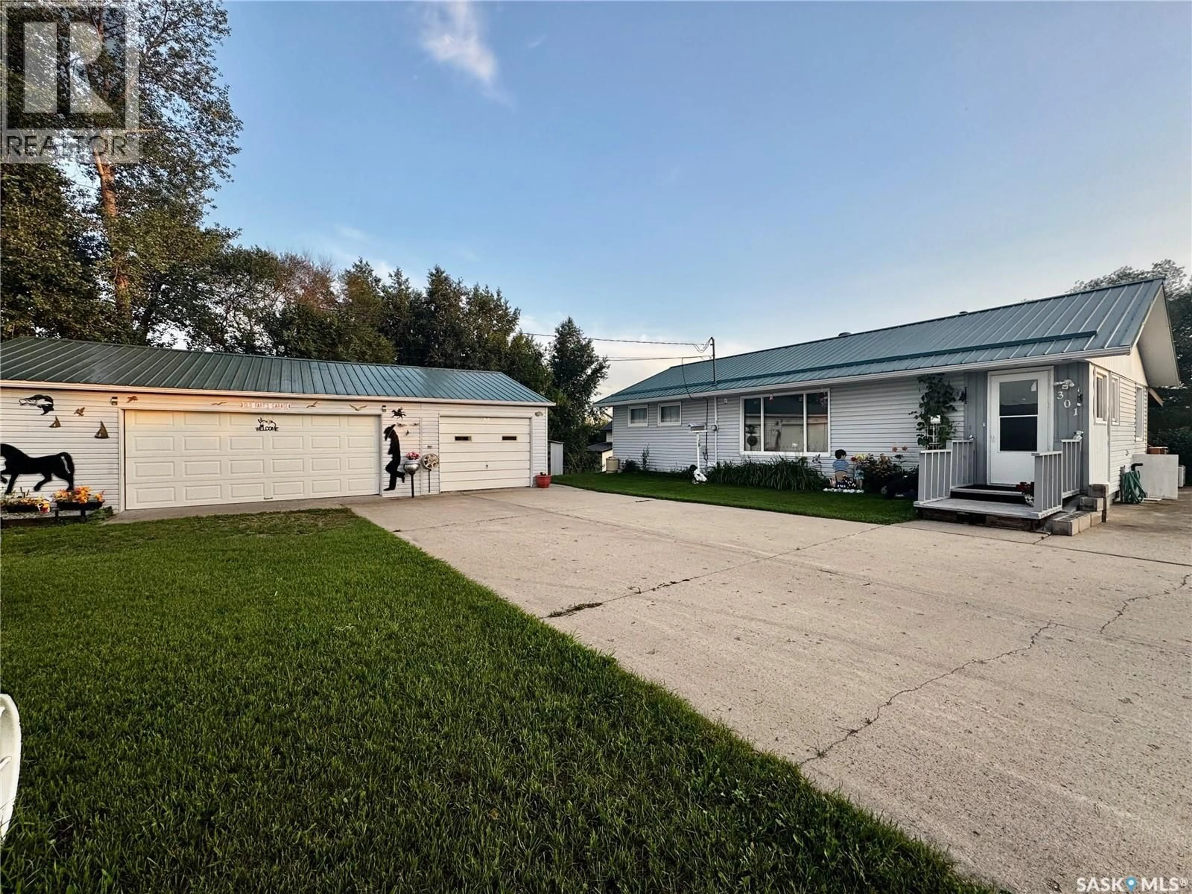 A pic from outside/outdoor area/front of a property/back of a property/a pic from drone, street for SE - 301 1ST STREET, Sturgis Saskatchewan S0A4A0