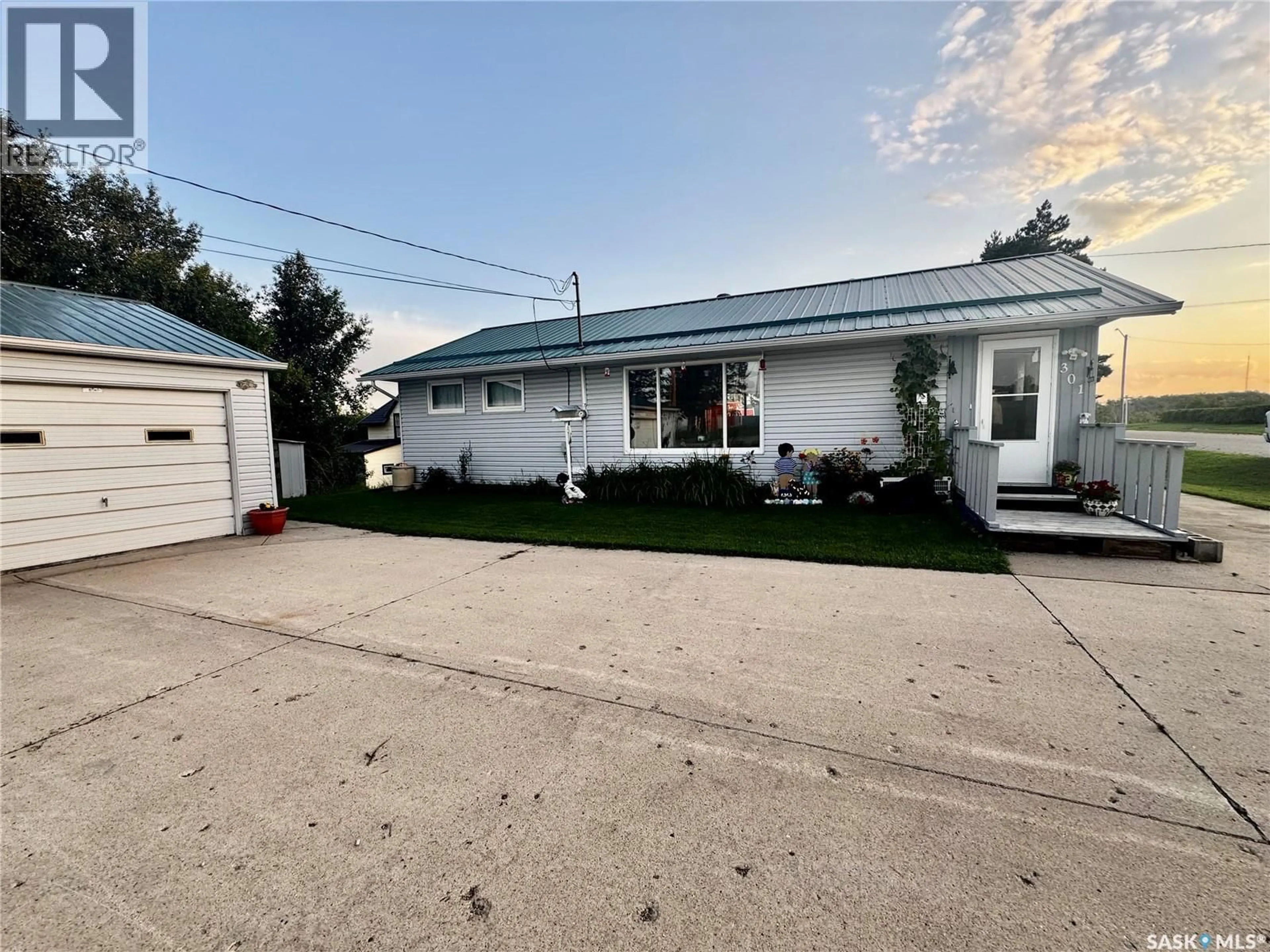 A pic from outside/outdoor area/front of a property/back of a property/a pic from drone, street for SE - 301 1ST STREET, Sturgis Saskatchewan S0A4A0