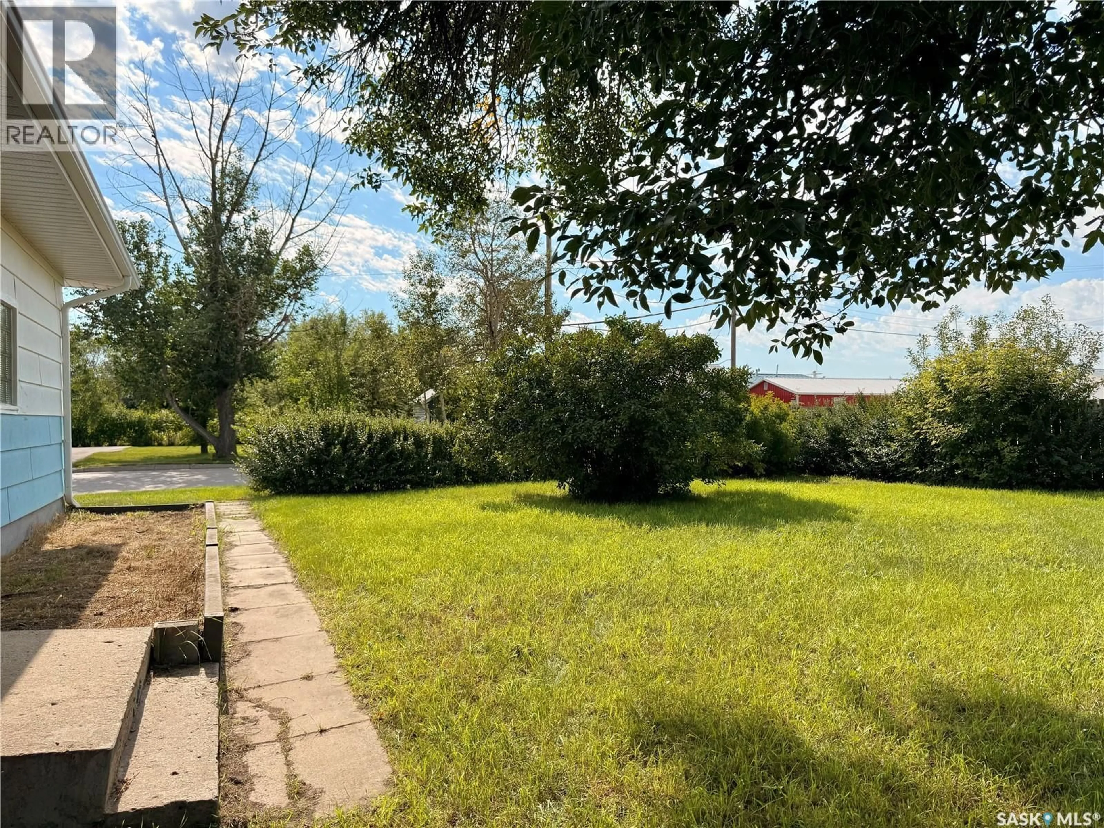 A pic from outside/outdoor area/front of a property/back of a property/a pic from drone, forest/trees view for 201 OTTAWA STREET, Davidson Saskatchewan S0G1A0