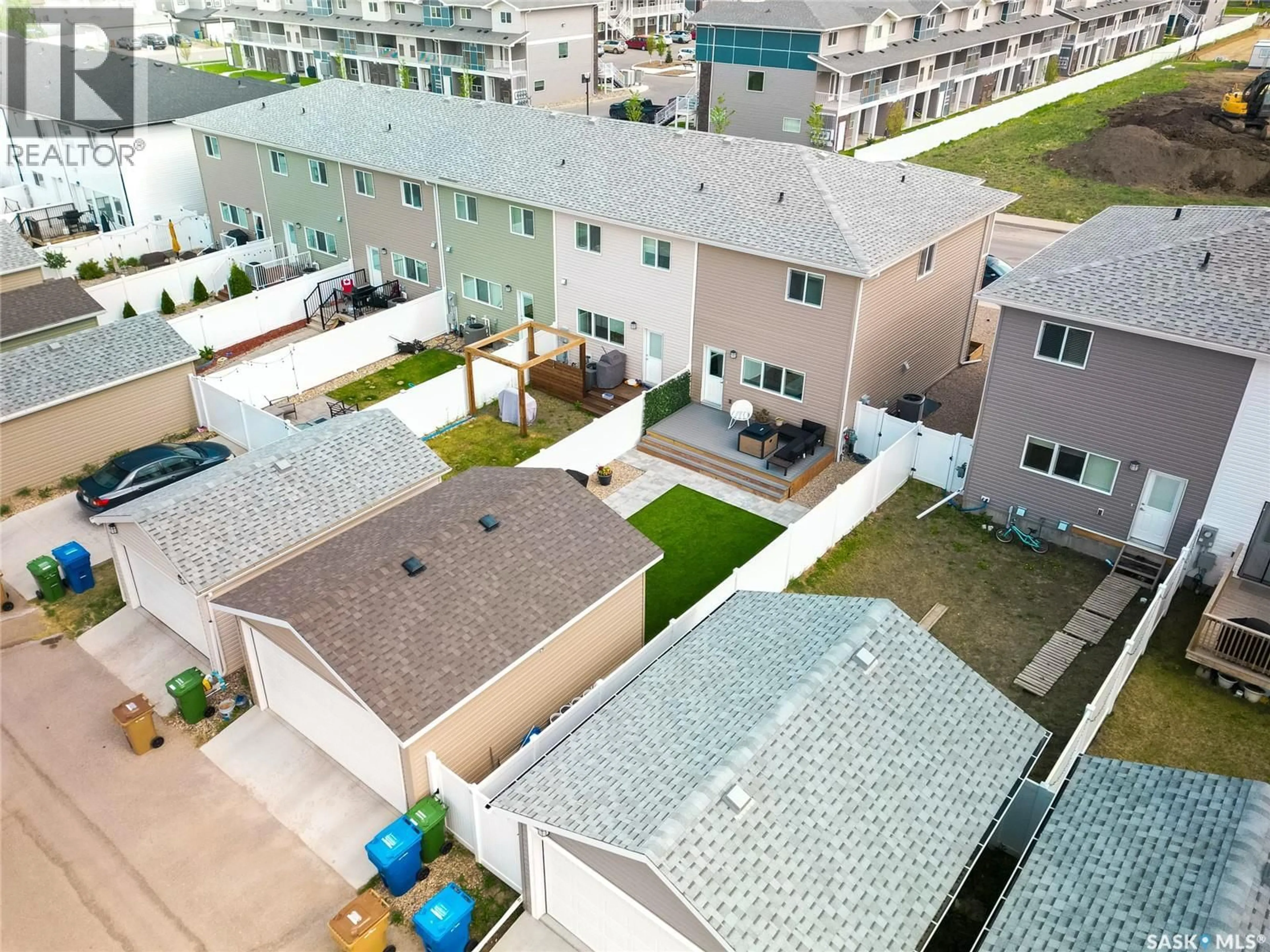 A pic from outside/outdoor area/front of a property/back of a property/a pic from drone, unknown for 5024 PRIMROSE GREEN DRIVE, Regina Saskatchewan S4V3S5