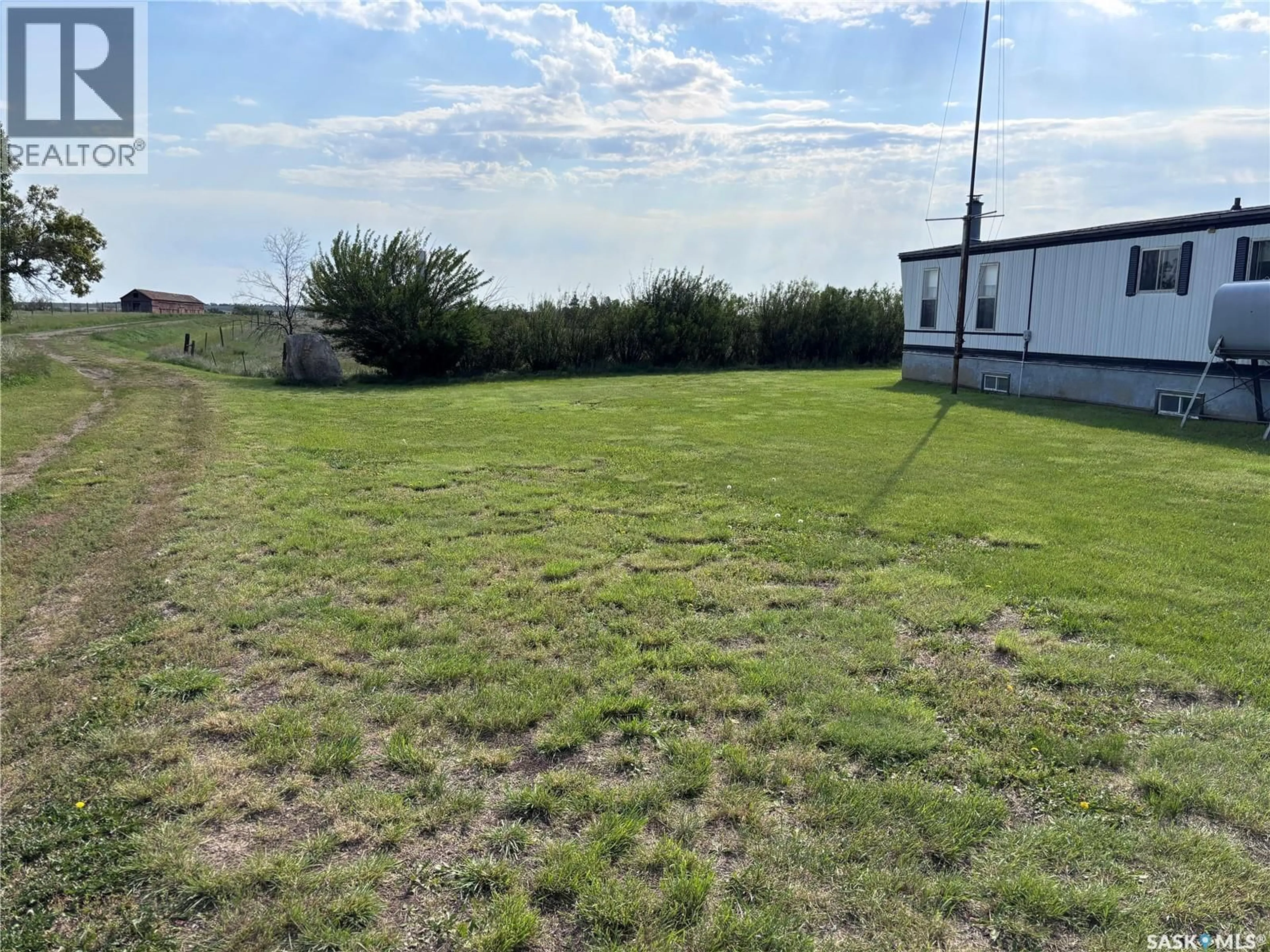 A pic from outside/outdoor area/front of a property/back of a property/a pic from drone, building for EMPEY ACREAGE, Aneroid Saskatchewan S0N0C0
