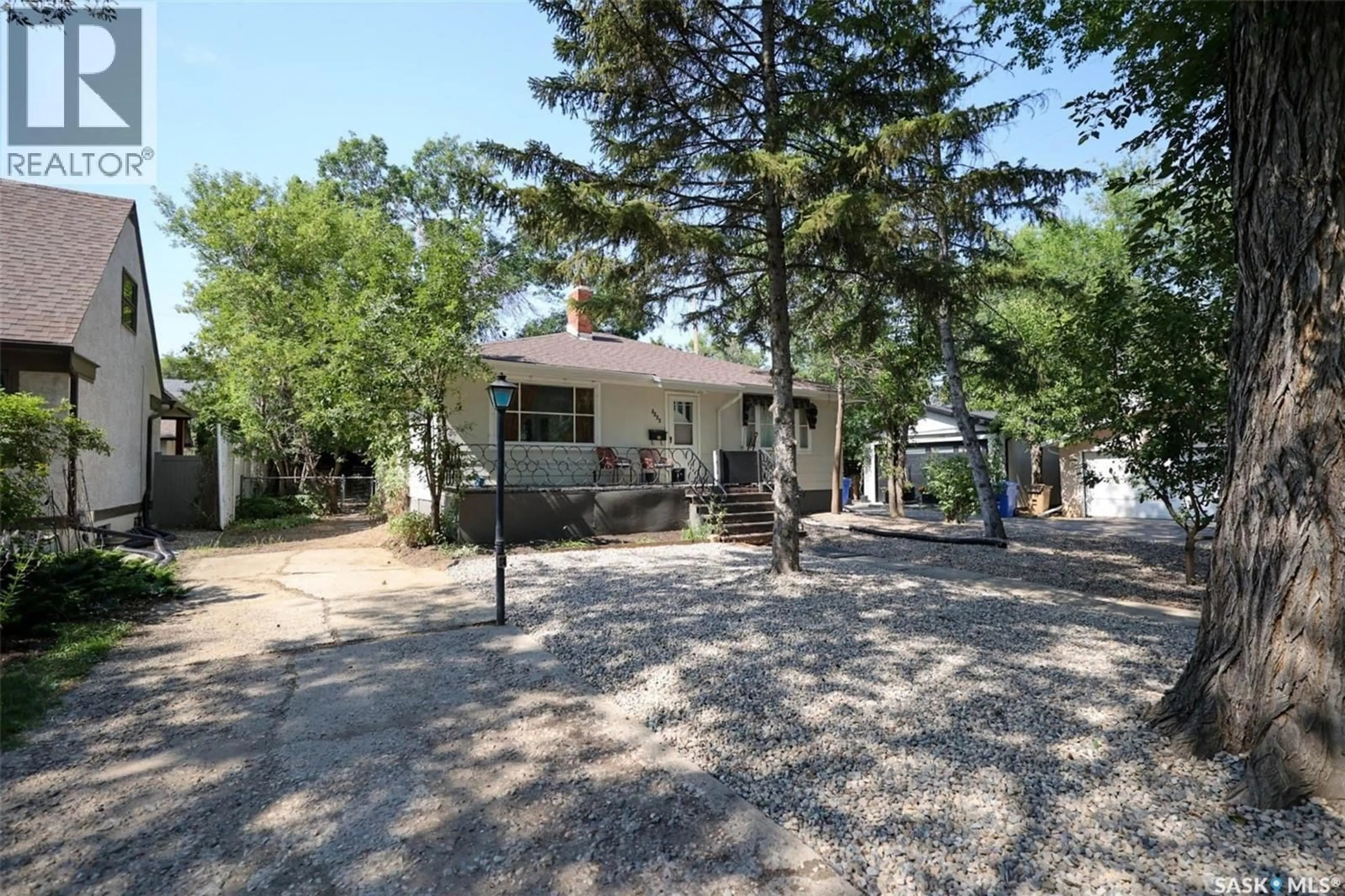 A pic from outside/outdoor area/front of a property/back of a property/a pic from drone, street for 3222 RAE STREET, Regina Saskatchewan S4S1S2