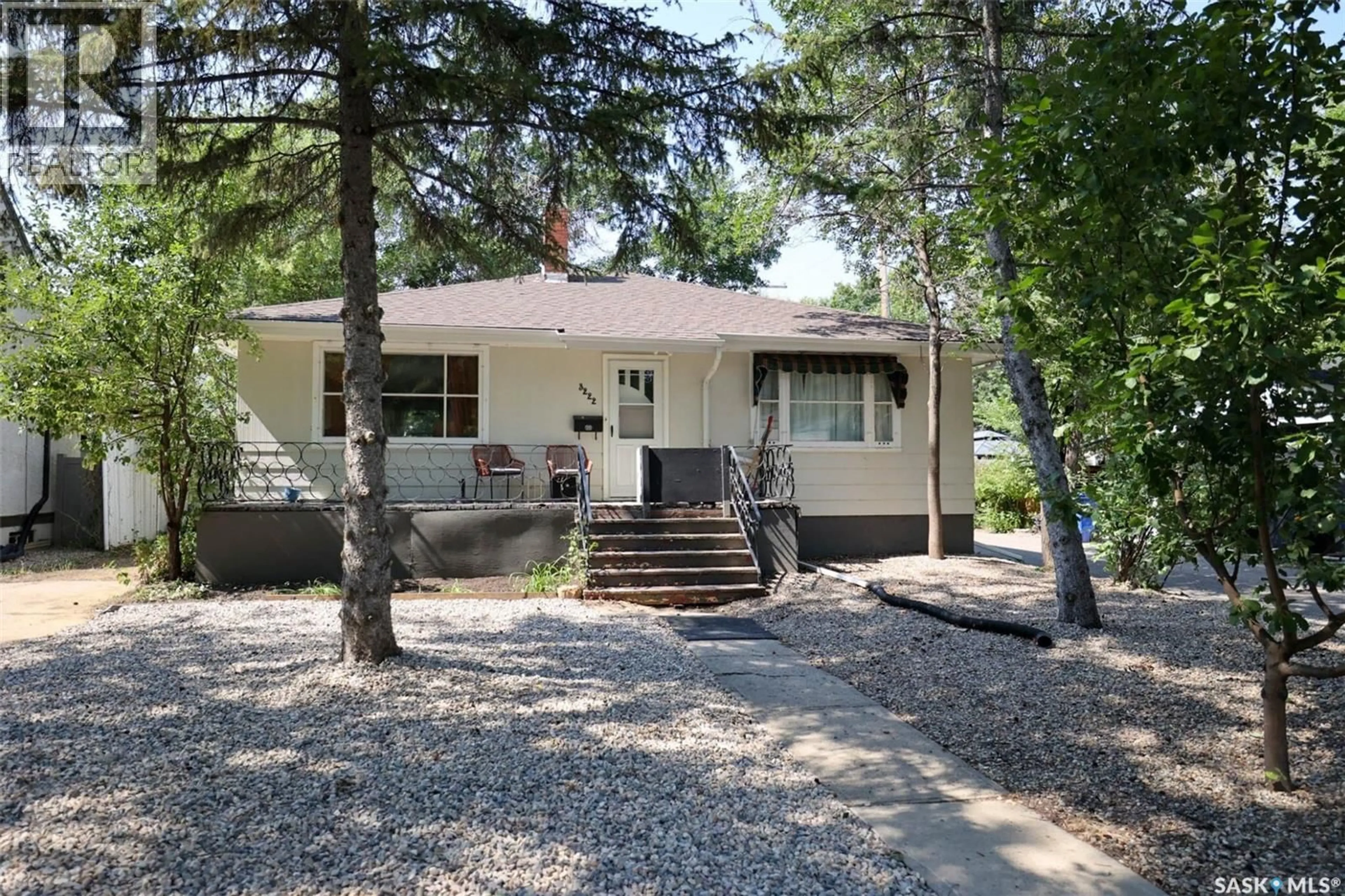 Home with vinyl exterior material, street for 3222 RAE STREET, Regina Saskatchewan S4S1S2