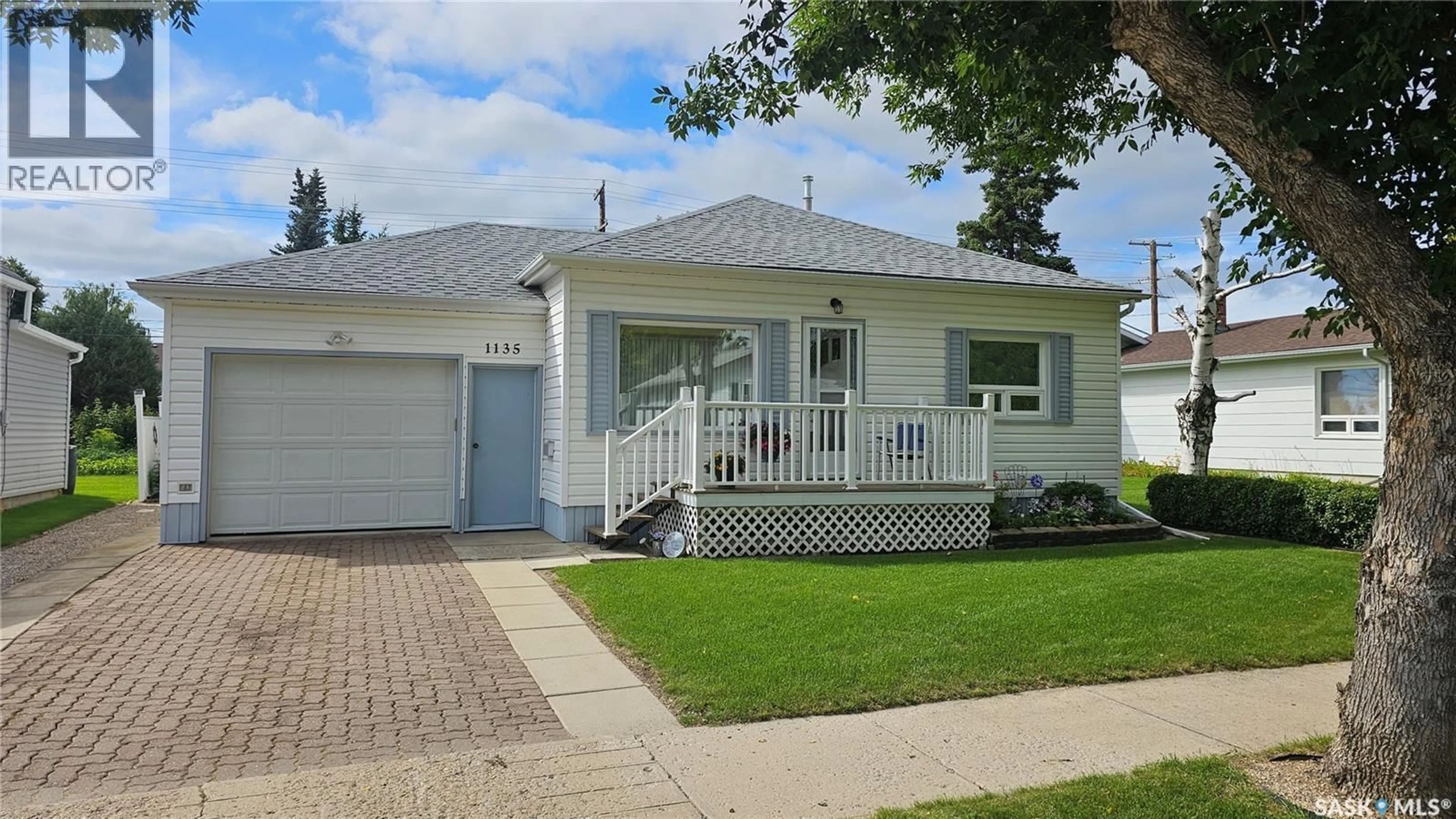 Home with vinyl exterior material, street for 1135 9TH STREET, Humboldt Saskatchewan S0K2A0