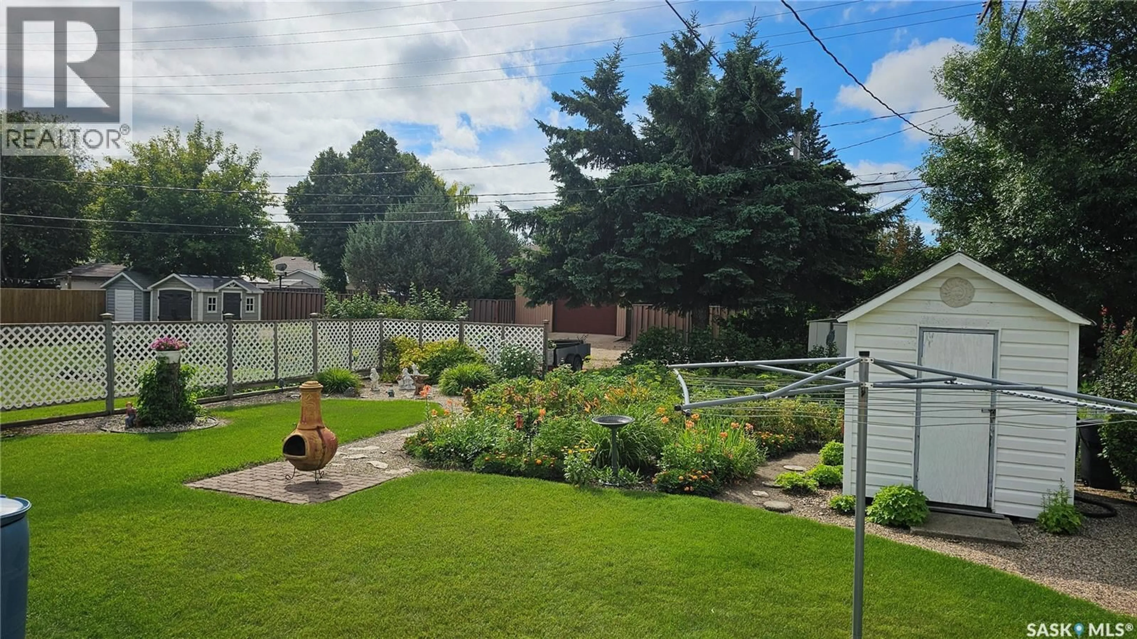 A pic from outside/outdoor area/front of a property/back of a property/a pic from drone, unknown for 1135 9TH STREET, Humboldt Saskatchewan S0K2A0