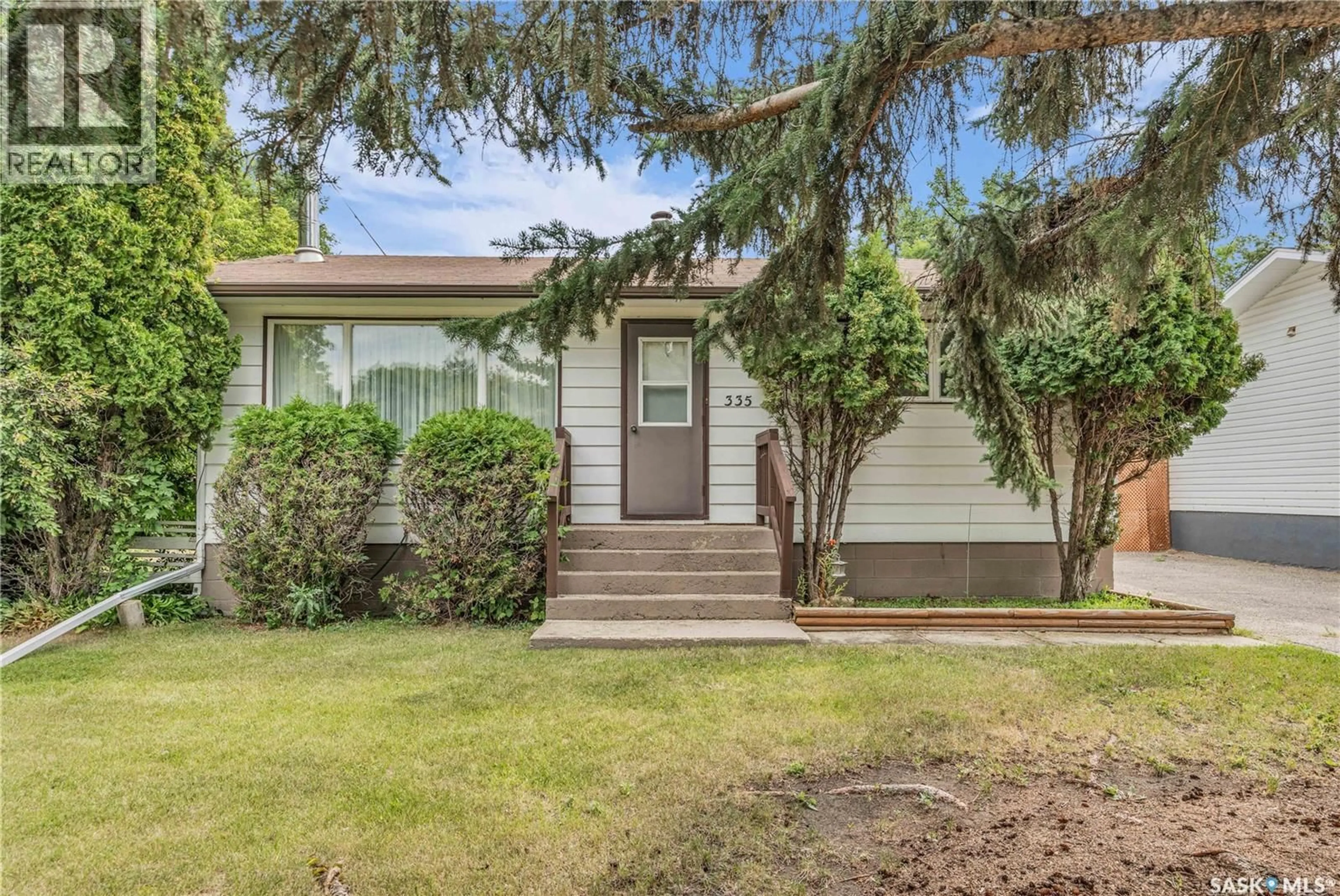 Home with vinyl exterior material, street for 335 CENTRAL AVENUE, Fort Qu'Appelle Saskatchewan S0G1S0