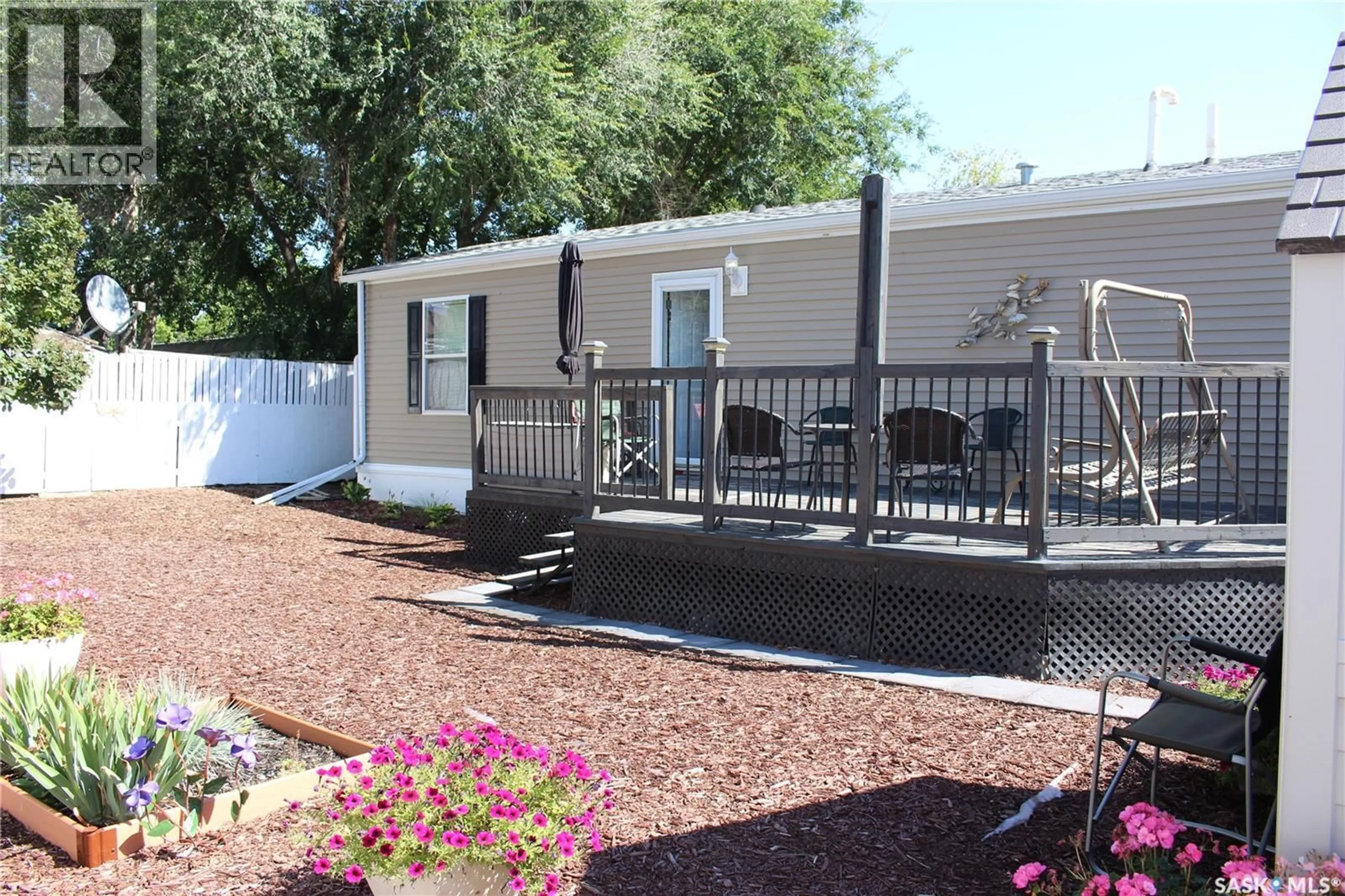Home with vinyl exterior material, street for J10 - 1295 9TH AVENUE, Moose Jaw Saskatchewan S6J1C5