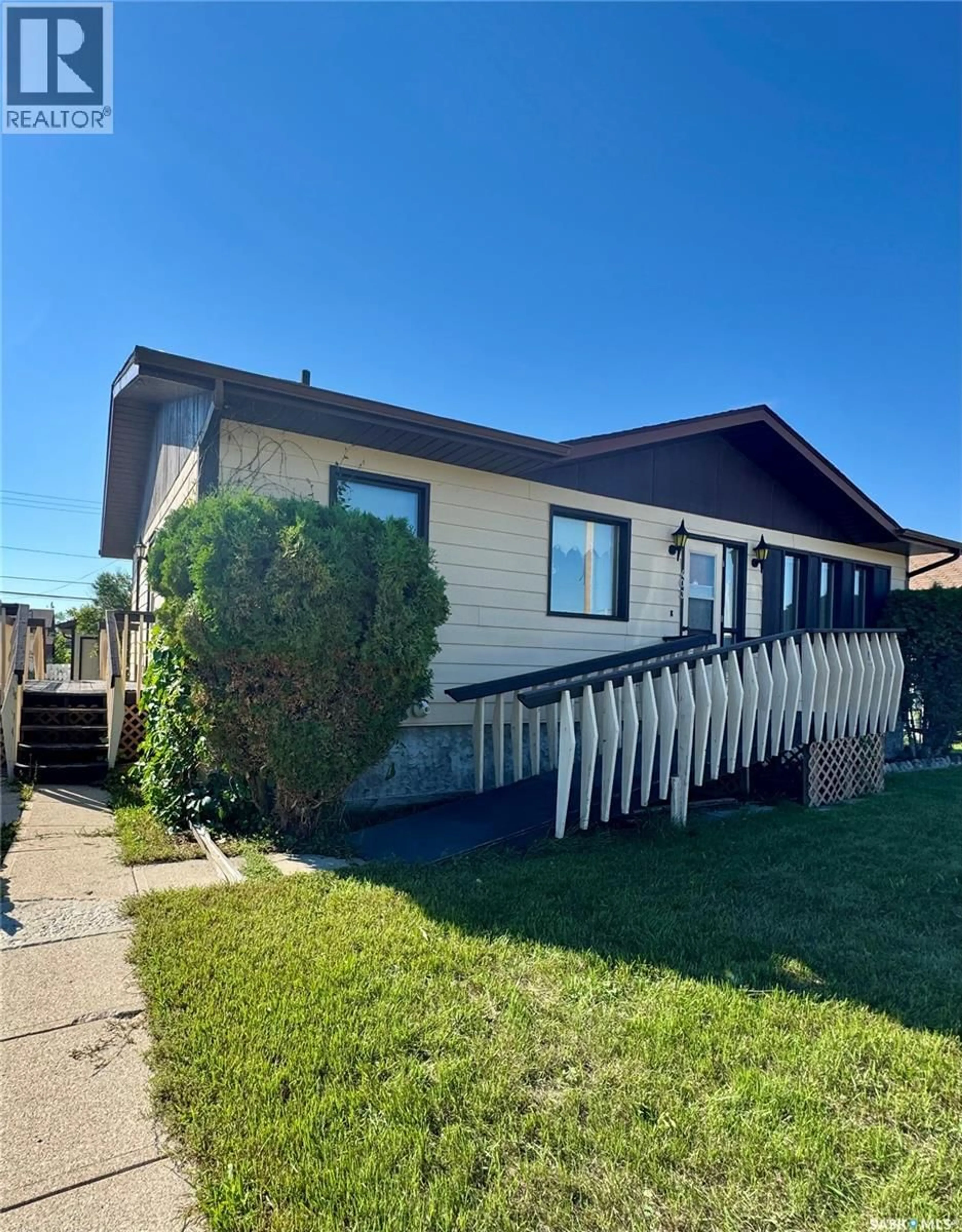 Home with vinyl exterior material, street for 403 CHURCHILL STREET, Hudson Bay Saskatchewan S0E0Y0
