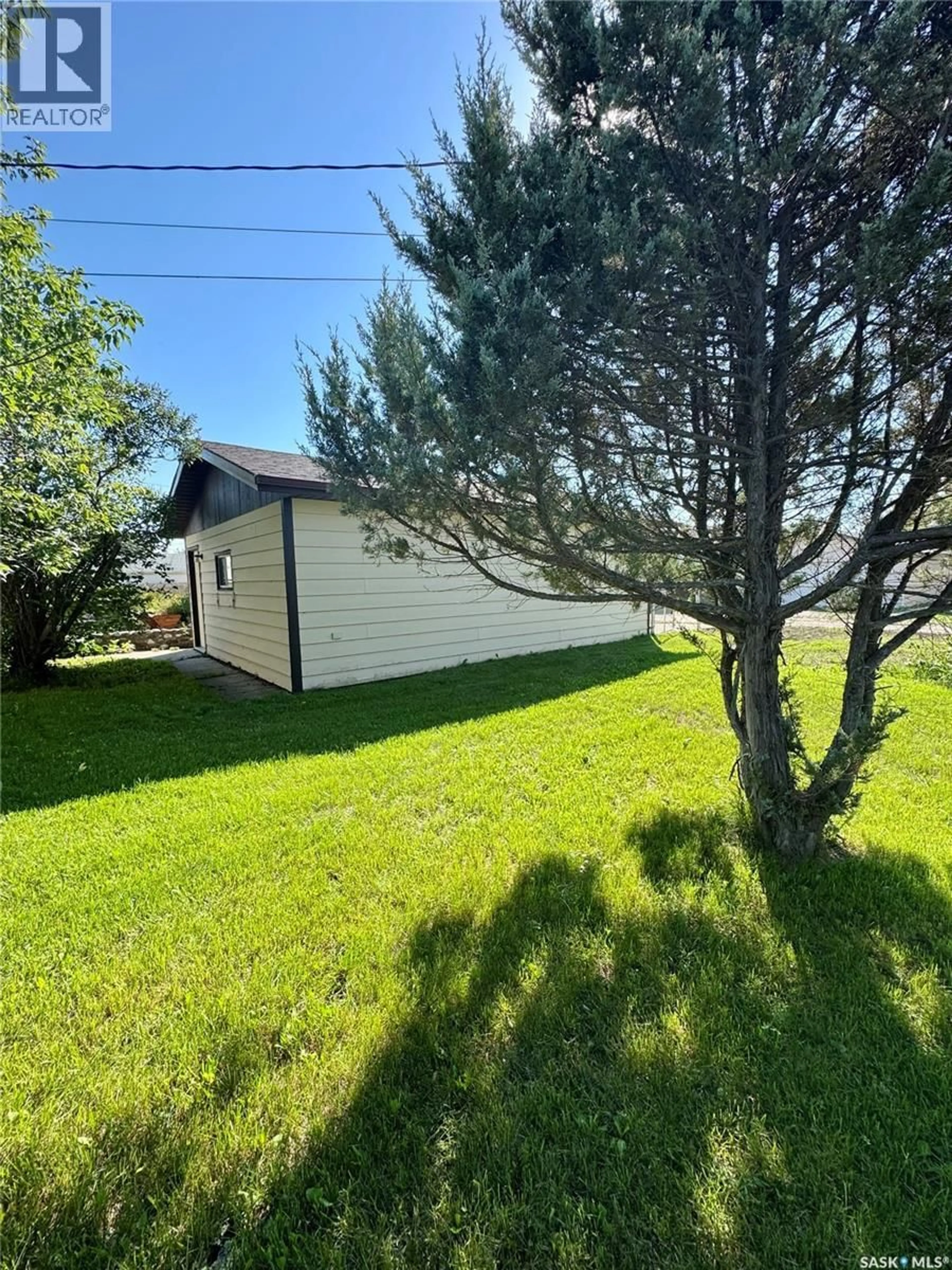 A pic from outside/outdoor area/front of a property/back of a property/a pic from drone, unknown for 403 CHURCHILL STREET, Hudson Bay Saskatchewan S0E0Y0
