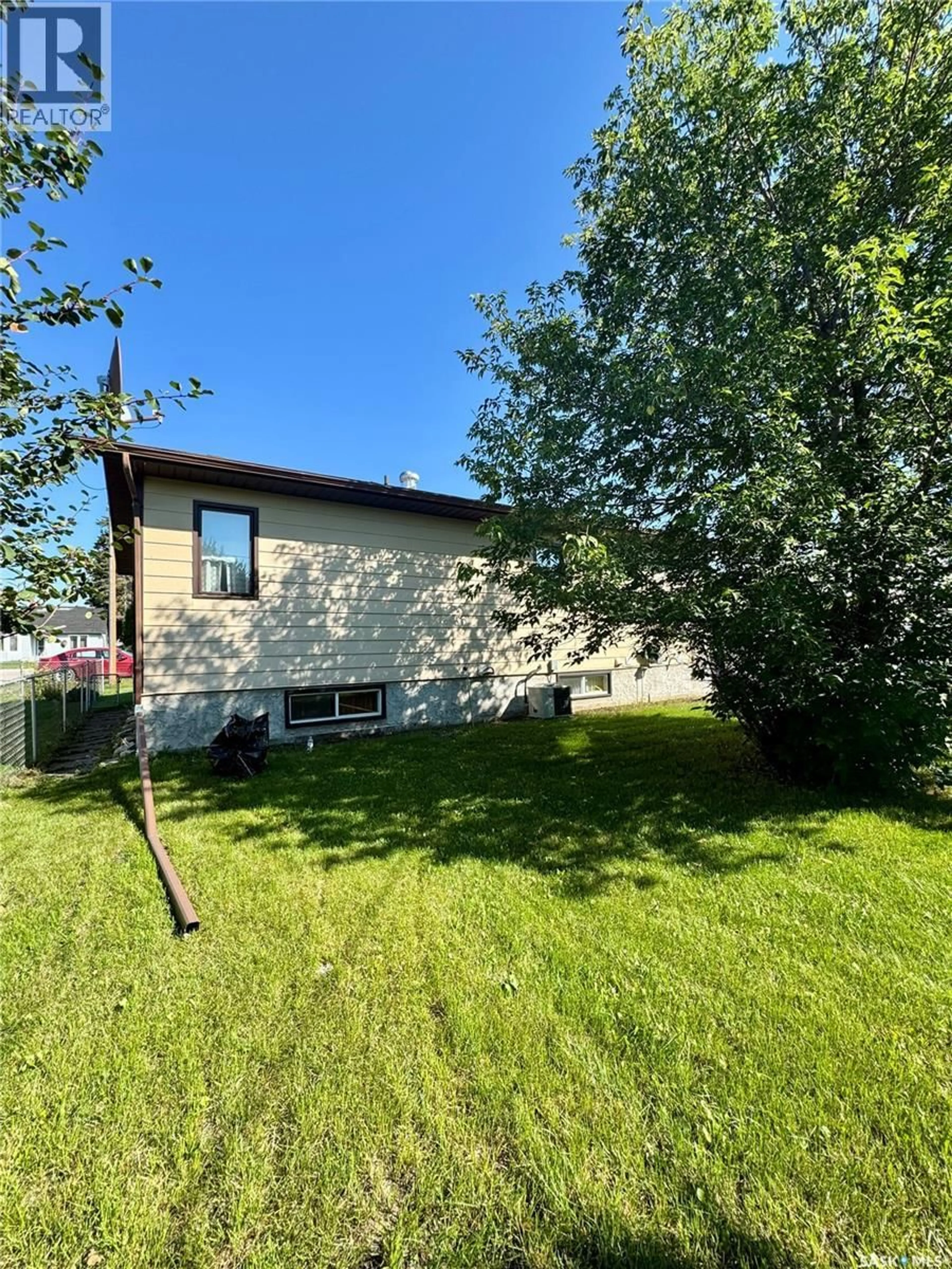 A pic from outside/outdoor area/front of a property/back of a property/a pic from drone, unknown for 403 CHURCHILL STREET, Hudson Bay Saskatchewan S0E0Y0