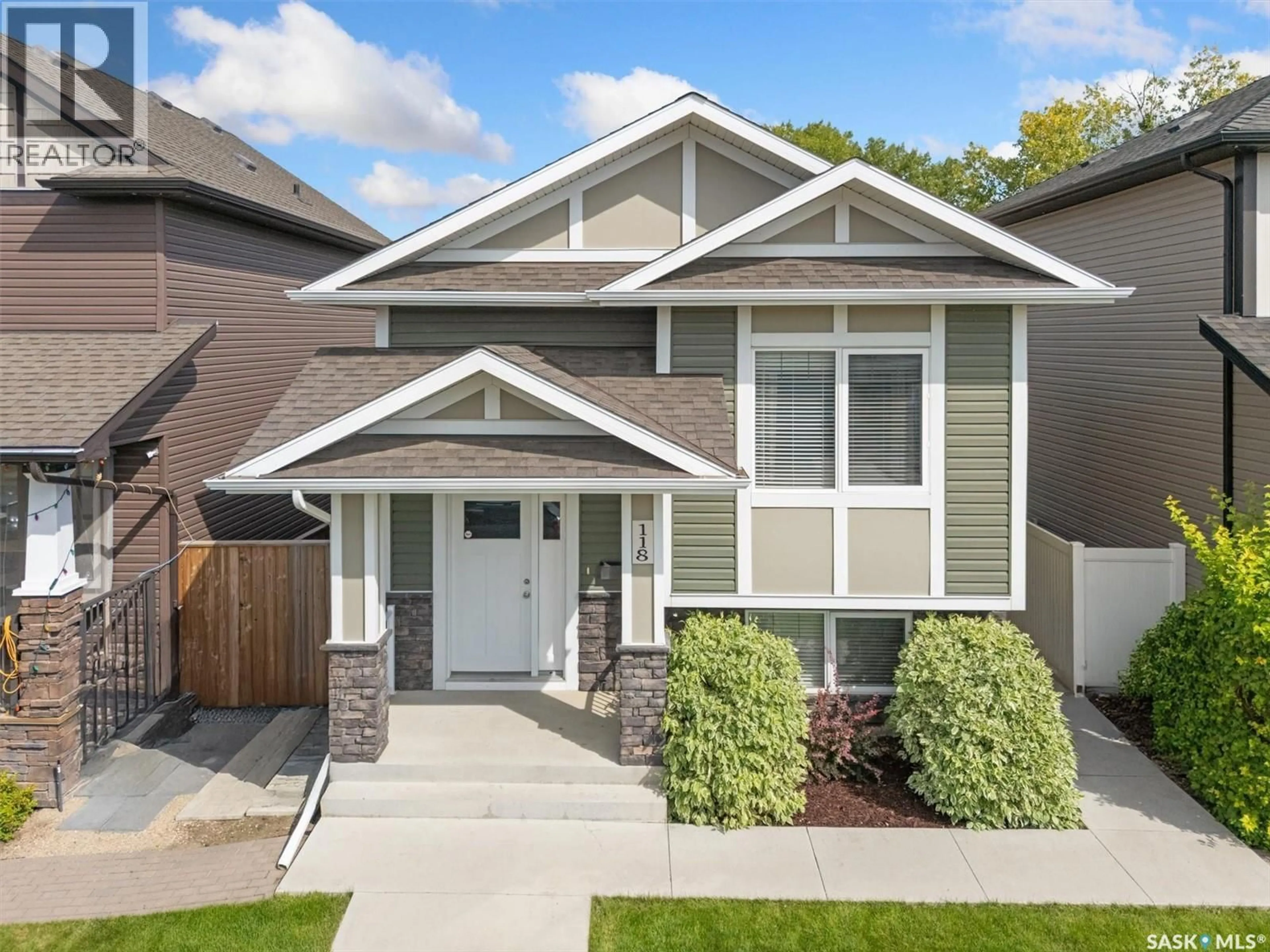 Home with vinyl exterior material, street for 118 CHILDERS CRESCENT, Saskatoon Saskatchewan S7L3G4