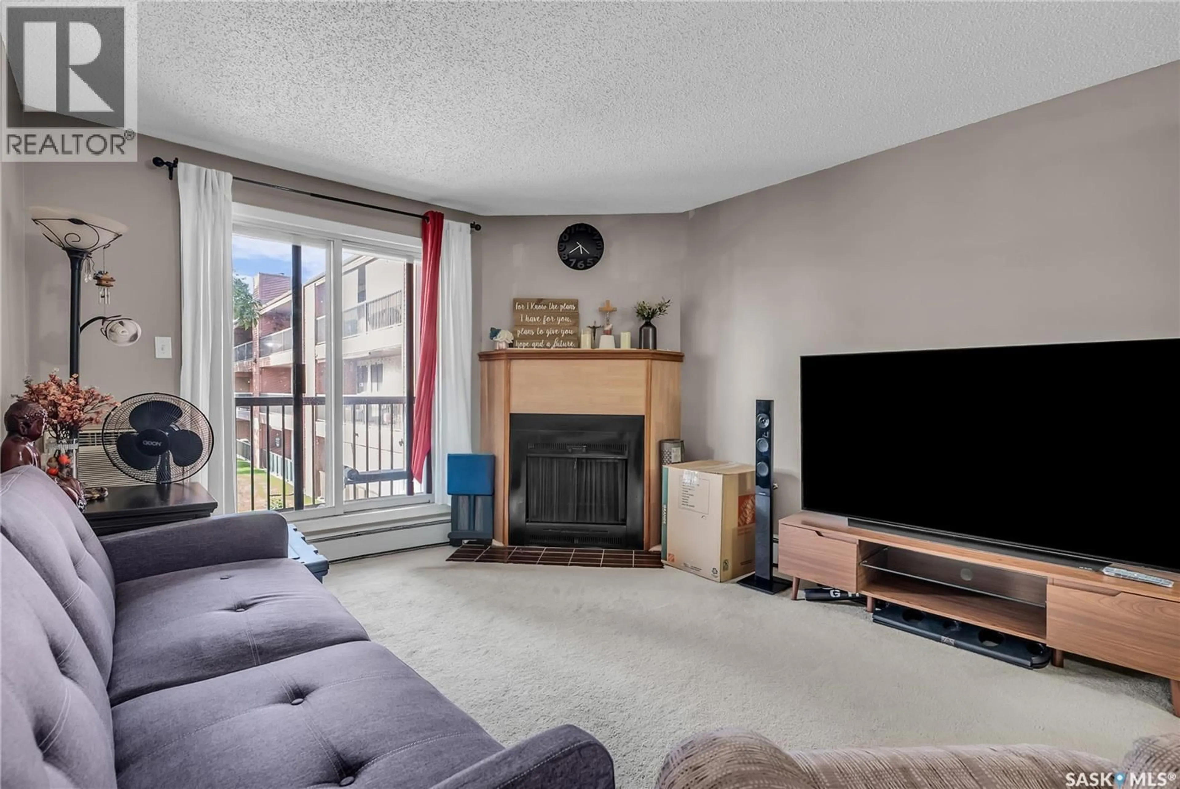 Living room with furniture, unknown for 215 - 3308 33RD STREET, Saskatoon Saskatchewan S7L6S6