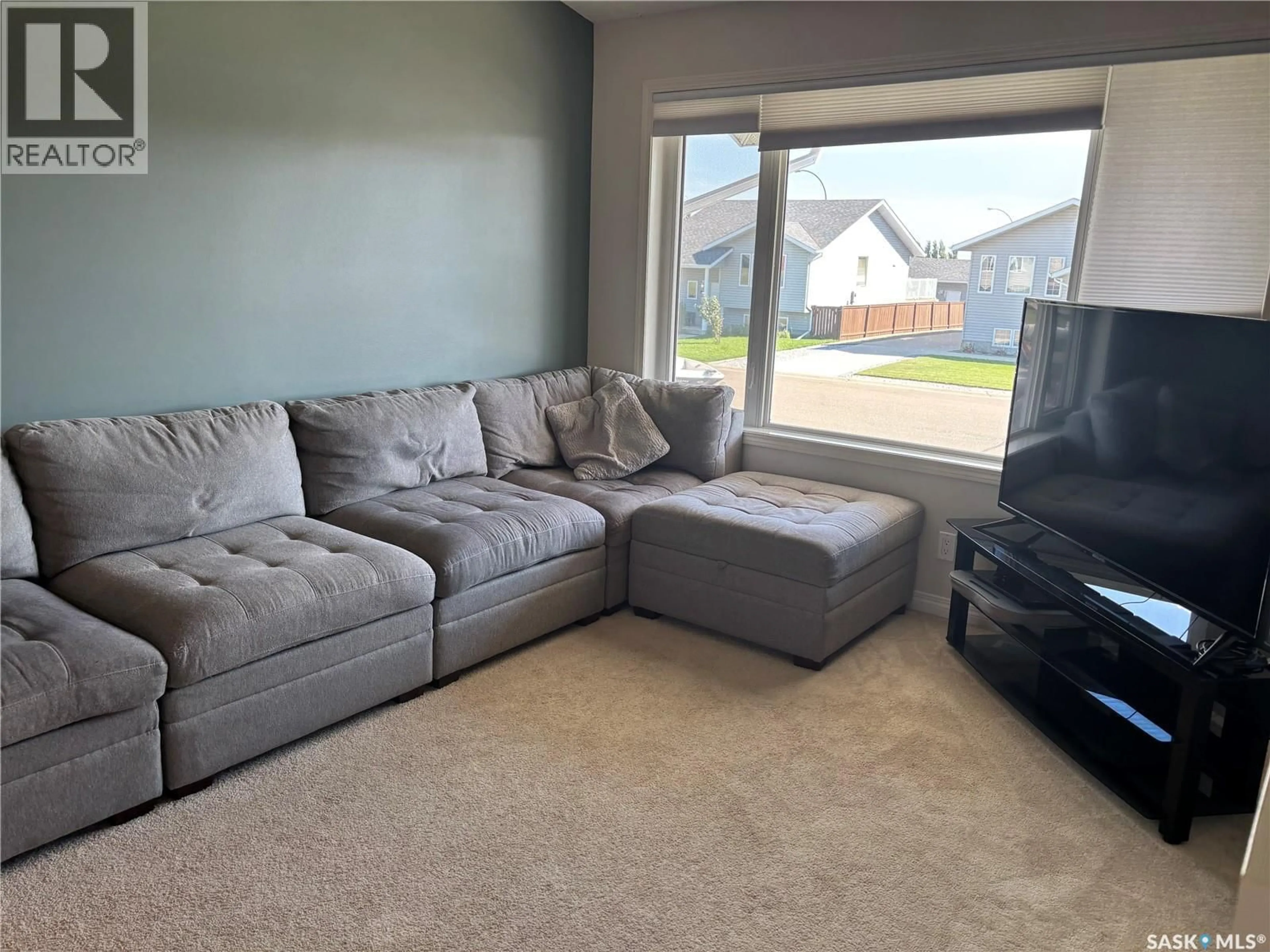 Living room with furniture, unknown for 813 LOCHWOOD PLACE, Swift Current Saskatchewan S9H4W9