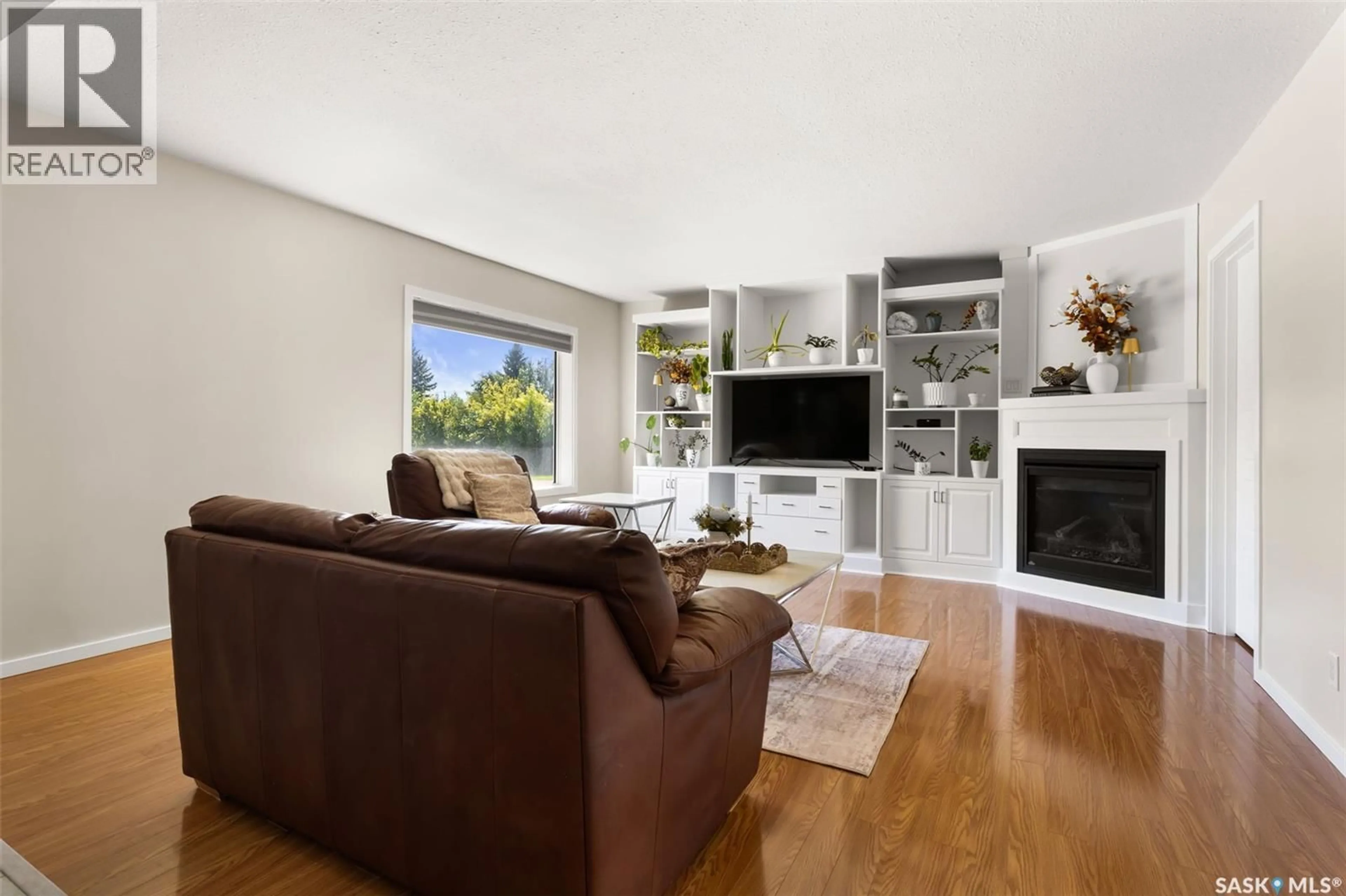 Living room with furniture, wood/laminate floor for 217 1ST AVENUE, Vibank Saskatchewan S0G4Y0