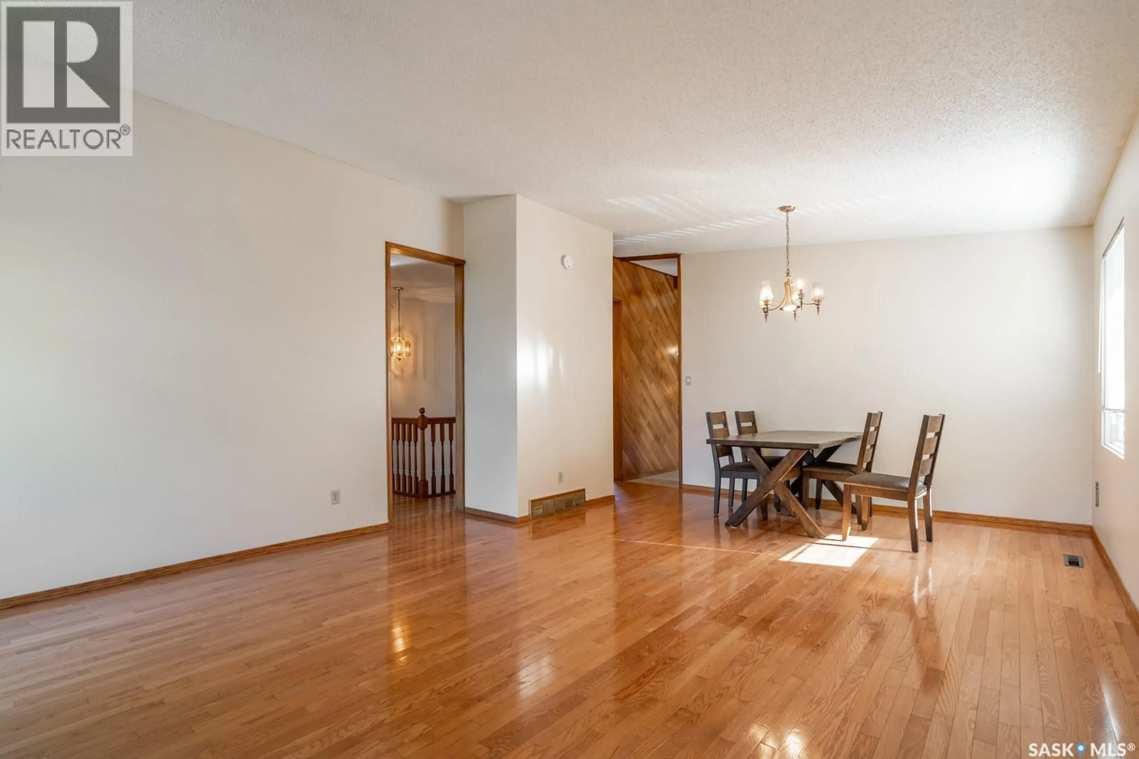 Dining room, wood/laminate floor for 51 SUNSET DRIVE, Regina Saskatchewan S4S5V6