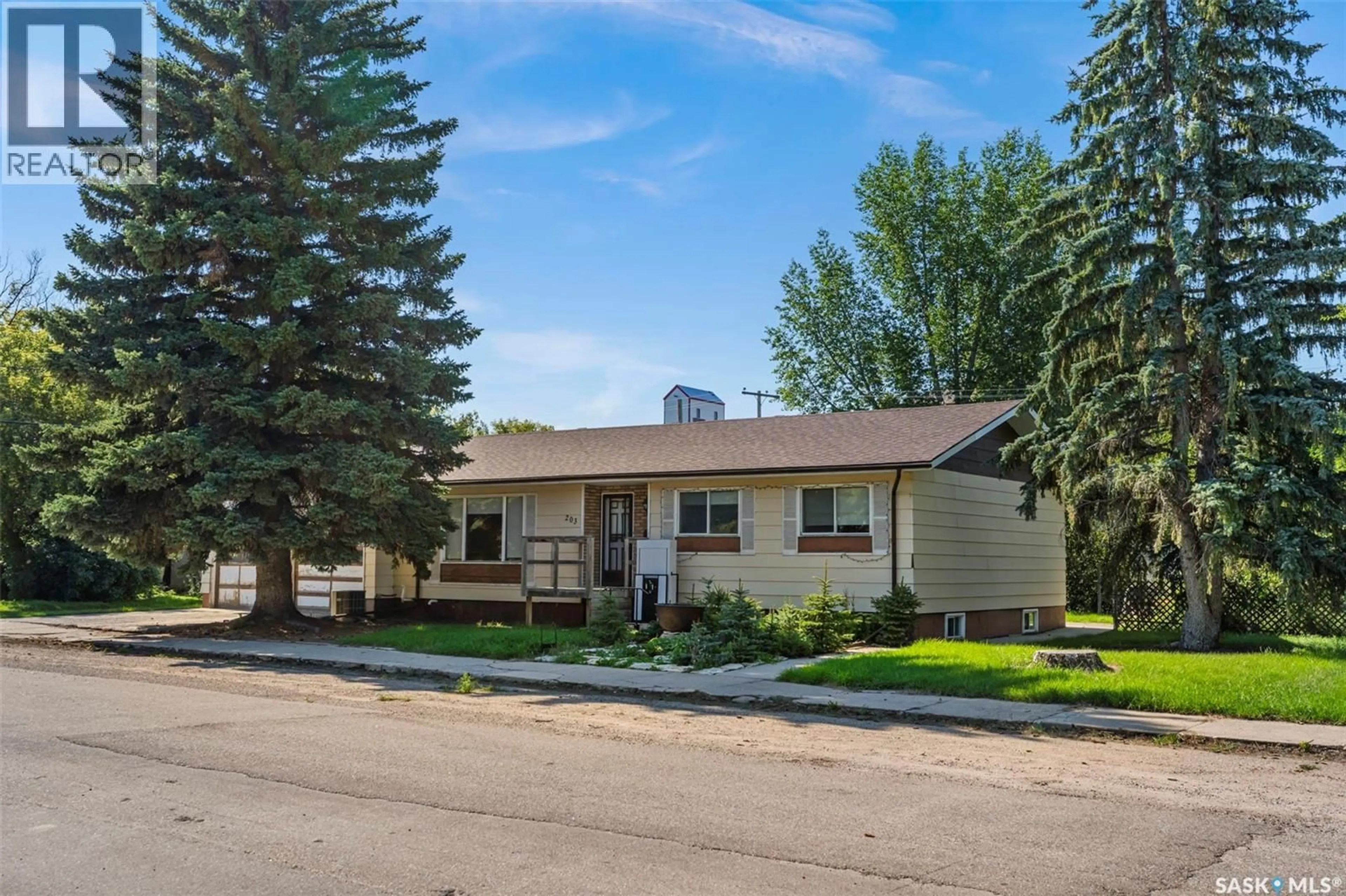 Home with vinyl exterior material, street for 203 1ST AVENUE, Harris Saskatchewan S0L1K0