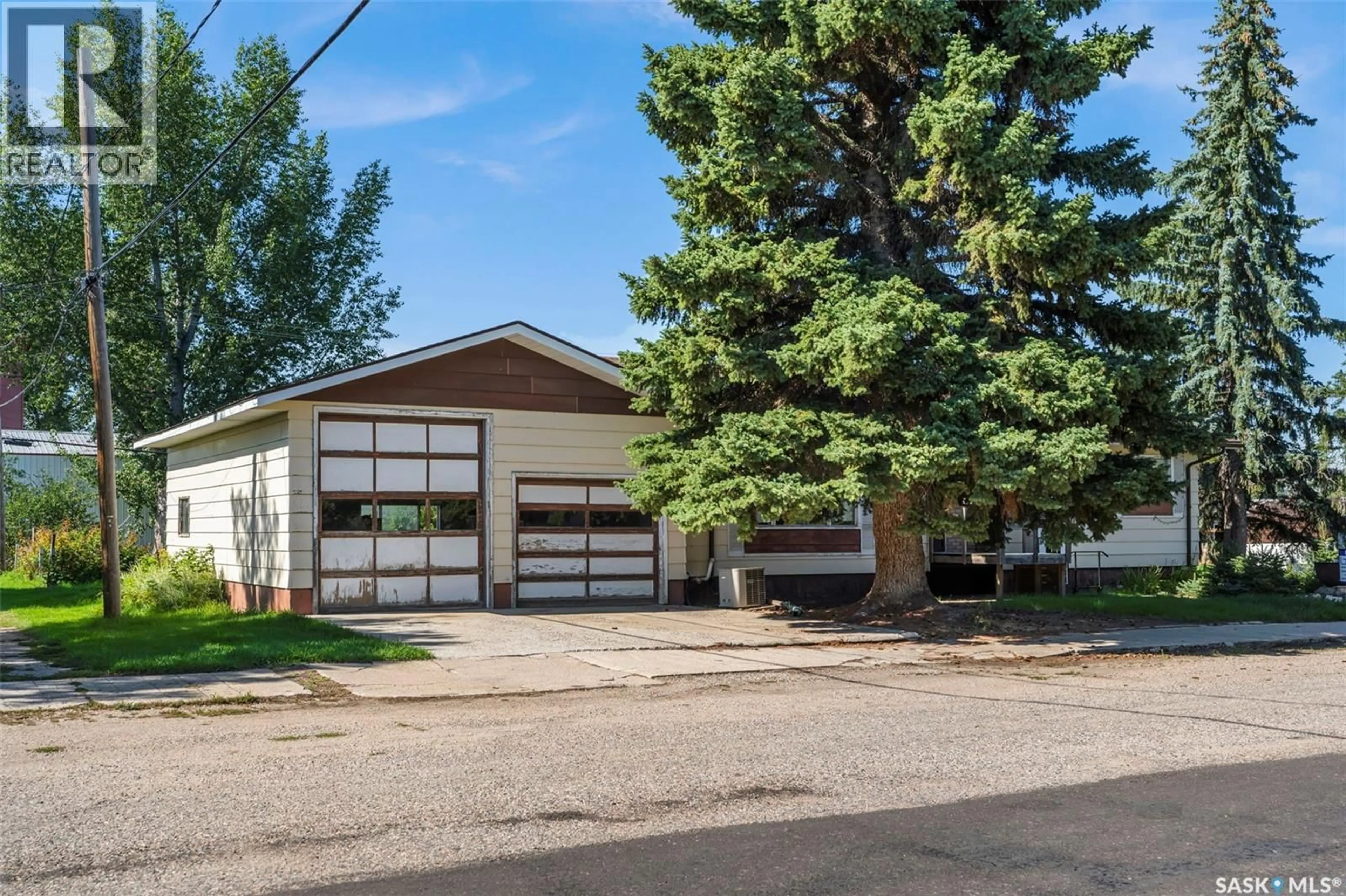 Home with vinyl exterior material, street for 203 1ST AVENUE, Harris Saskatchewan S0L1K0