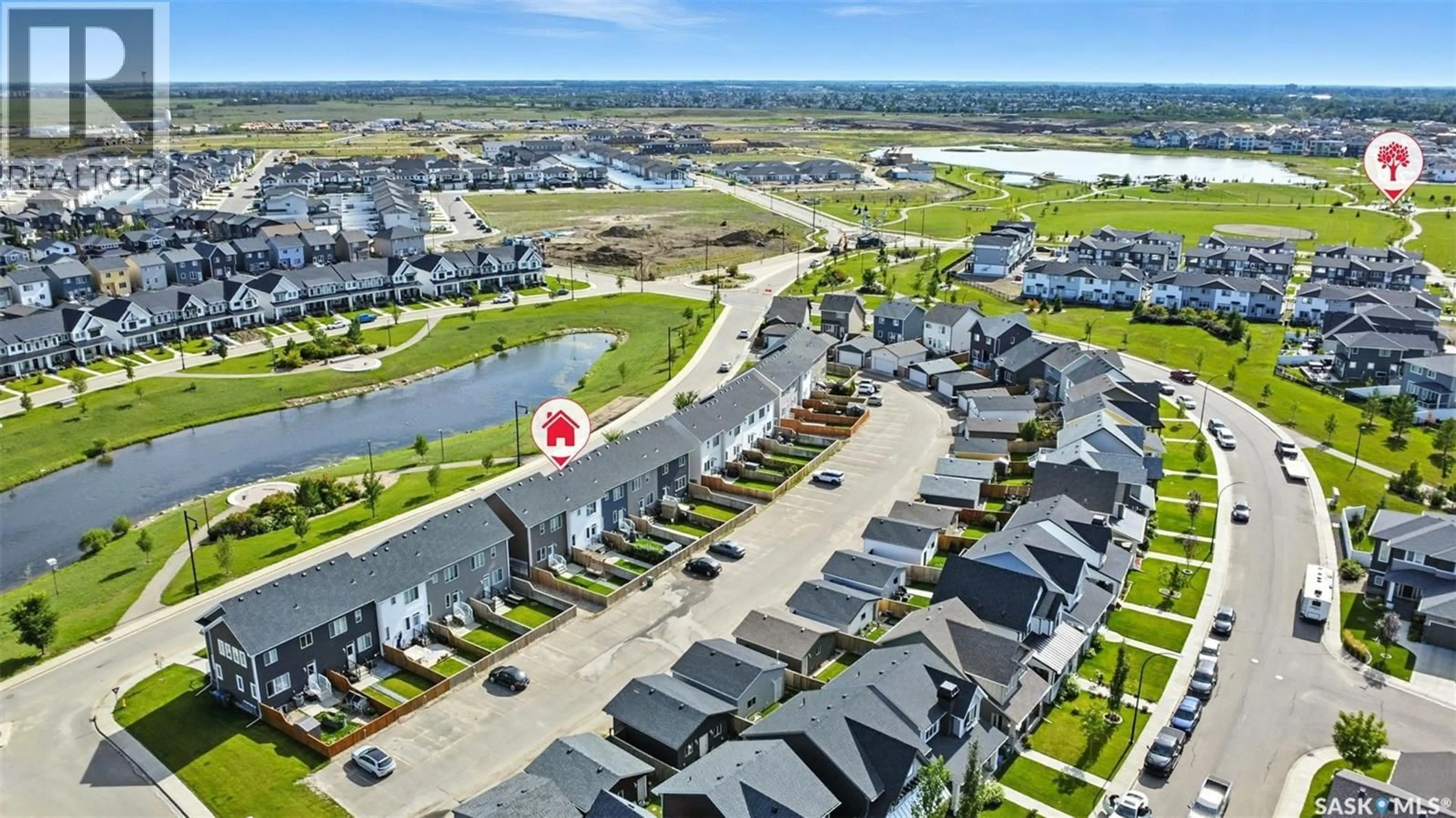 A pic from outside/outdoor area/front of a property/back of a property/a pic from drone, water/lake/river/ocean view for 2046 BRIGHTON COMMON, Saskatoon Saskatchewan S7V0N9