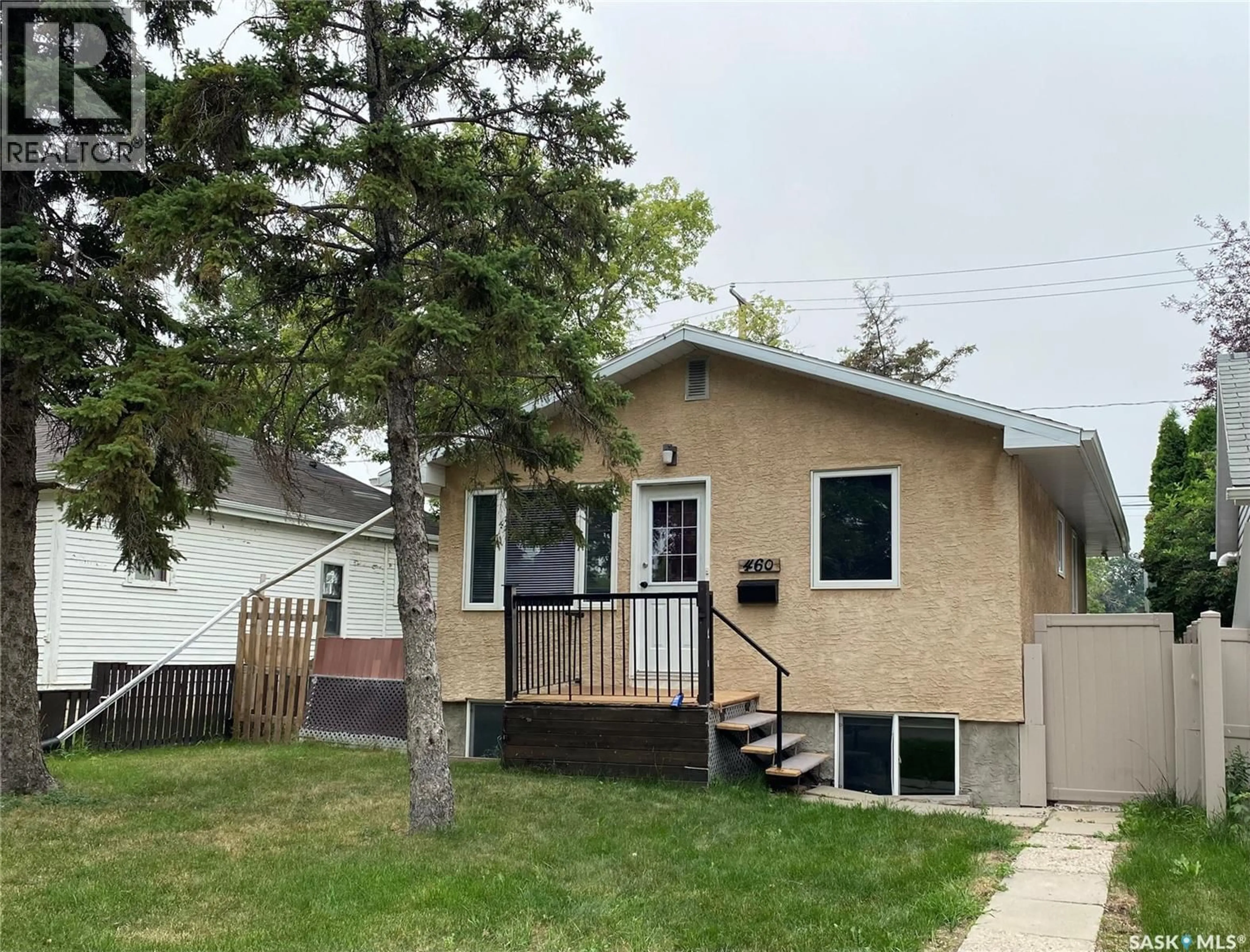 Home with vinyl exterior material, street for 460 WASCANA STREET, Regina Saskatchewan S4R4H9