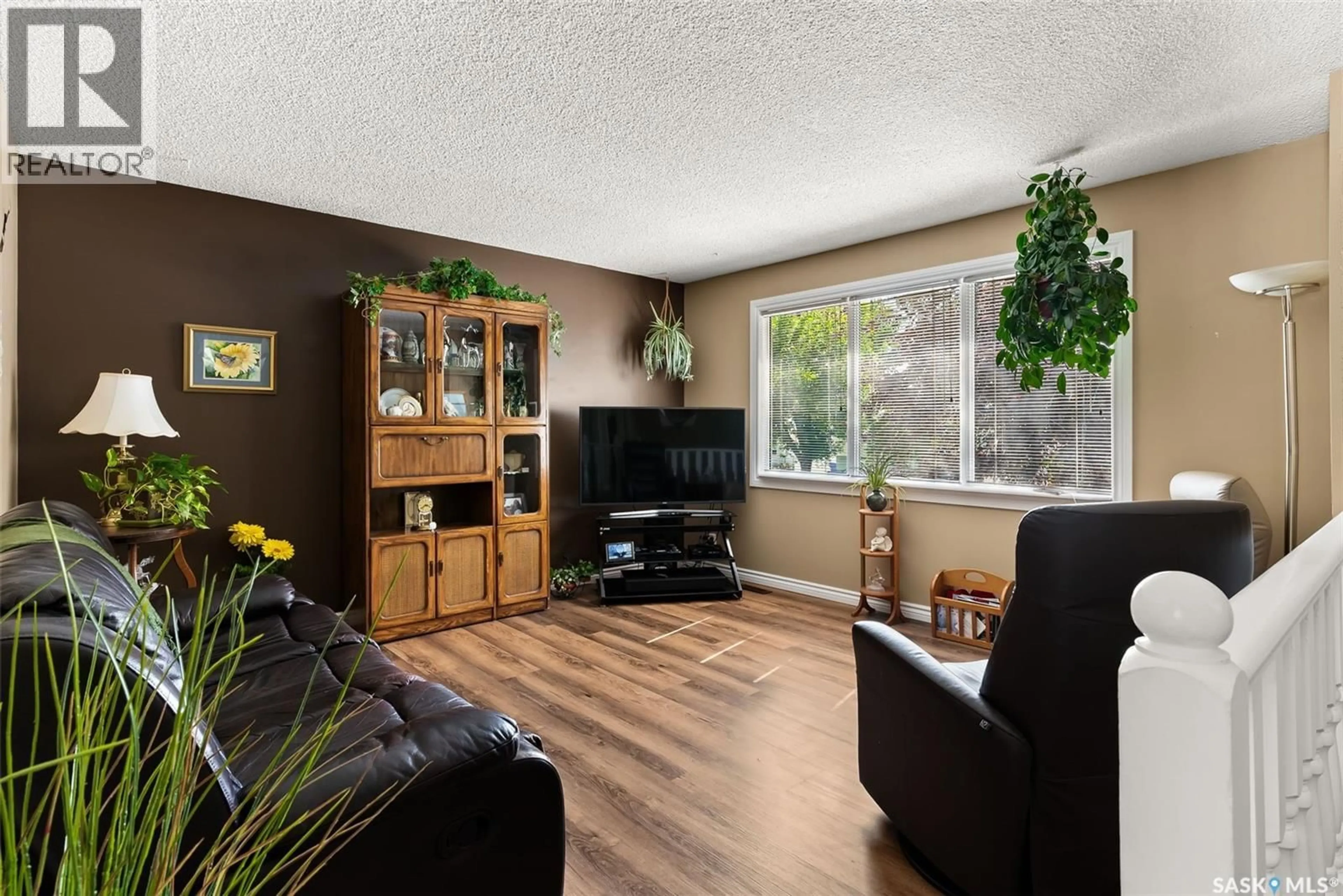 Living room with furniture, unknown for 99 MAGEE CRESCENT, Regina Saskatchewan S4R6K4