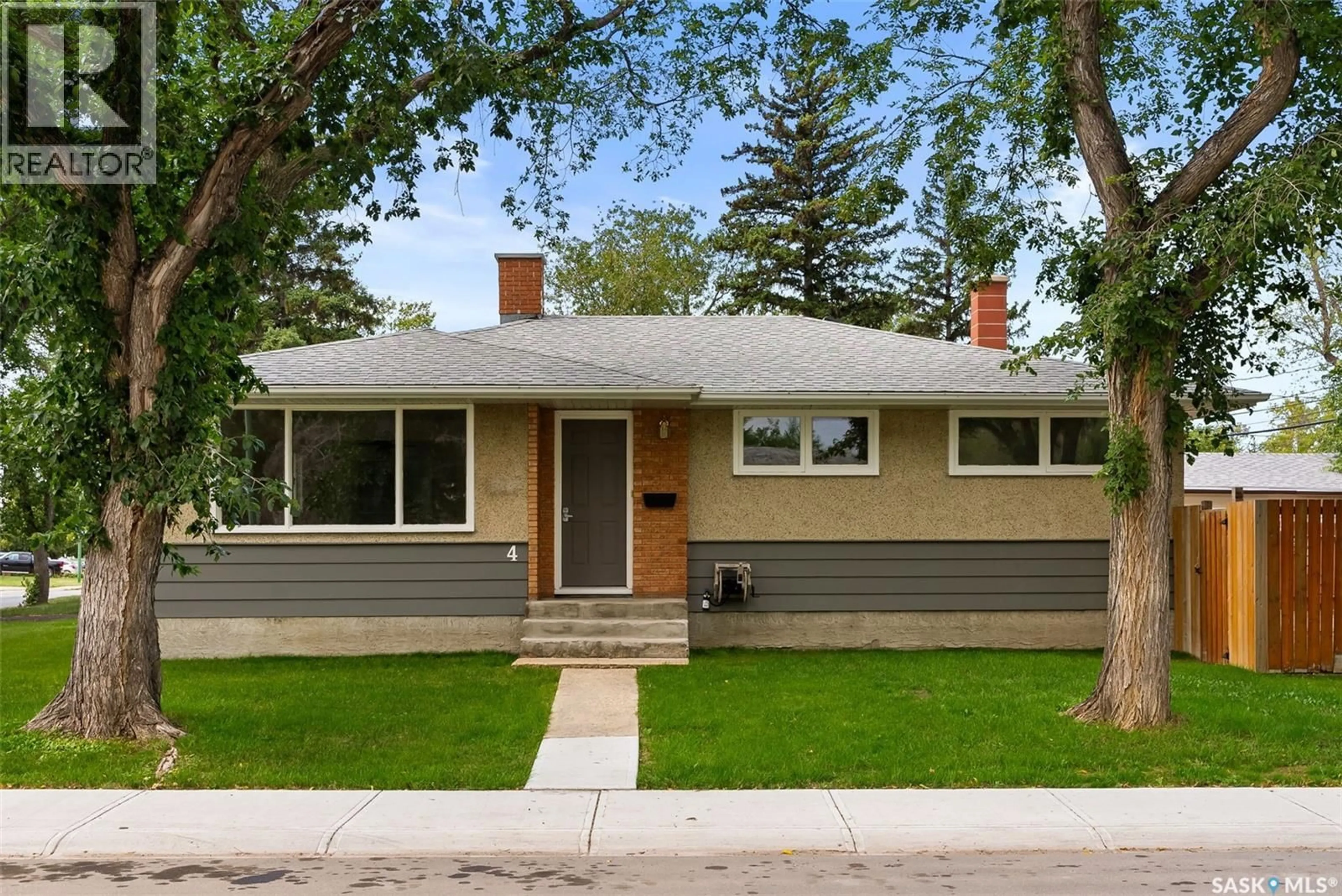 Home with vinyl exterior material, street for 4 BURROWS STREET, Regina Saskatchewan S4R4S2