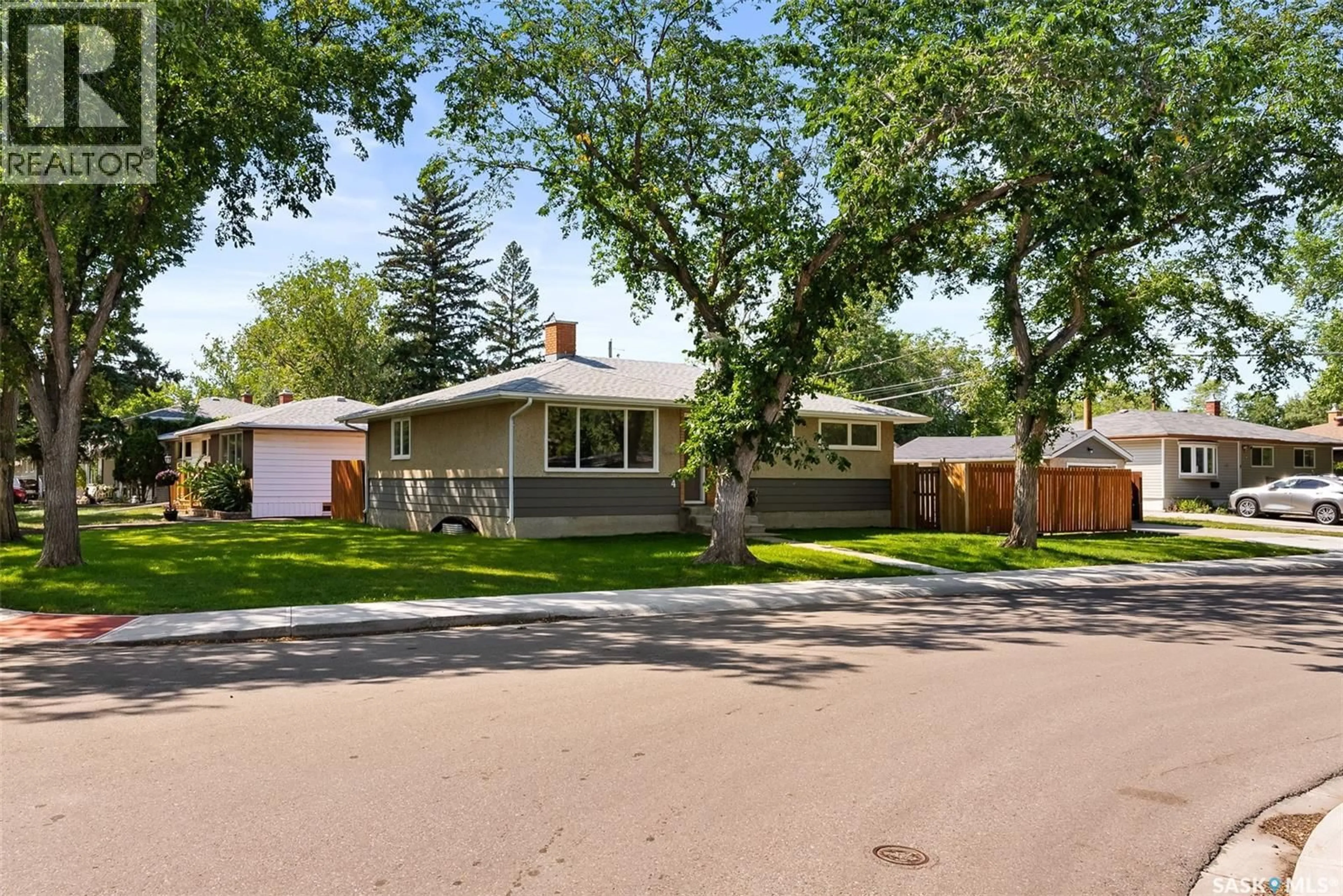 Home with vinyl exterior material, street for 4 BURROWS STREET, Regina Saskatchewan S4R4S2