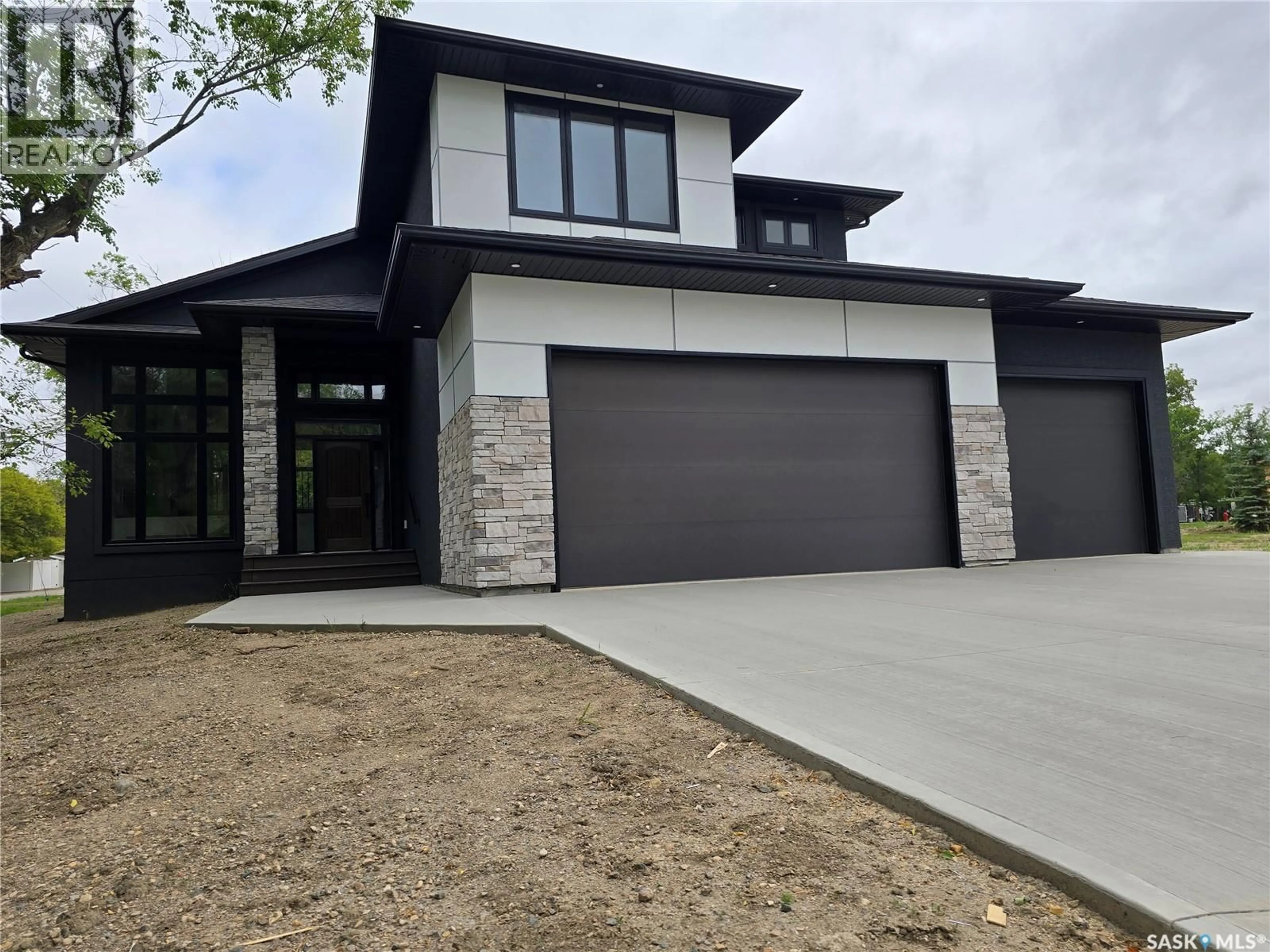Home with brick exterior material, street for 3 KENNEY CRESCENT, Weyburn Saskatchewan S4H0K5