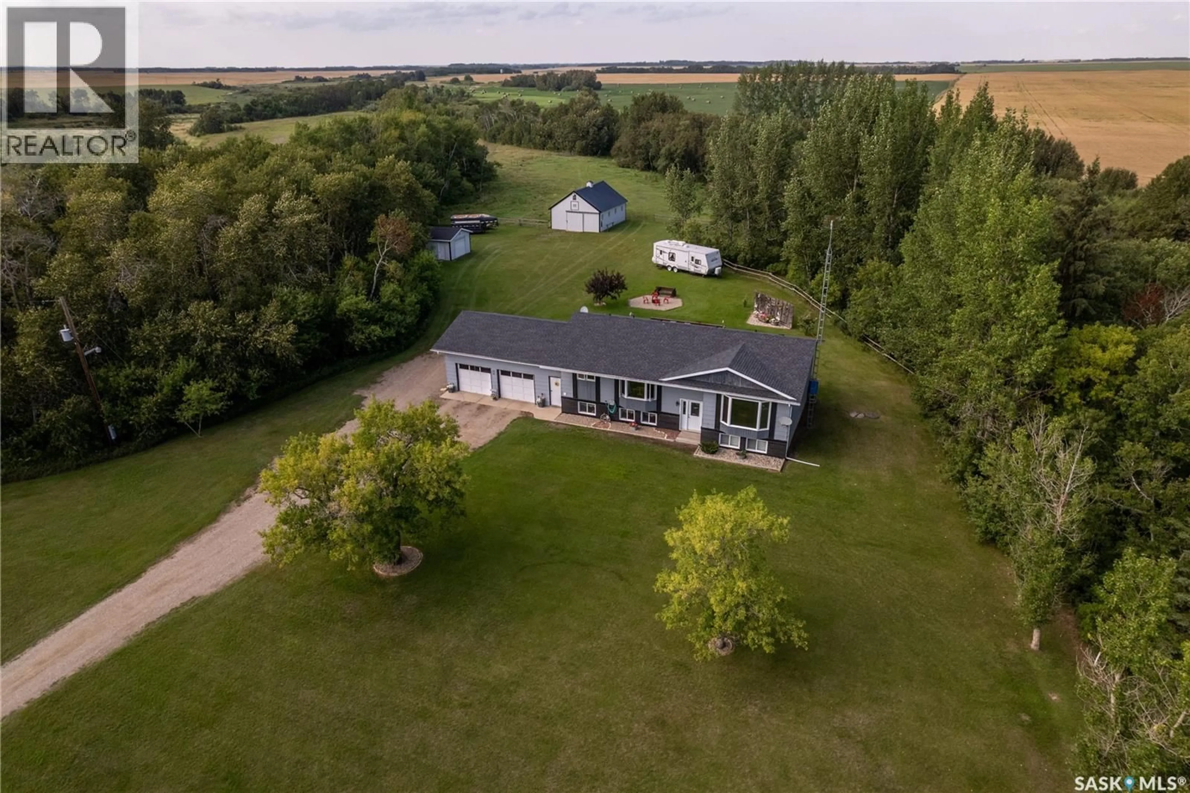 A pic from outside/outdoor area/front of a property/back of a property/a pic from drone, unknown for CLARK ACREAGE, Spy Hill Rm No. 152 Saskatchewan S0A3W0