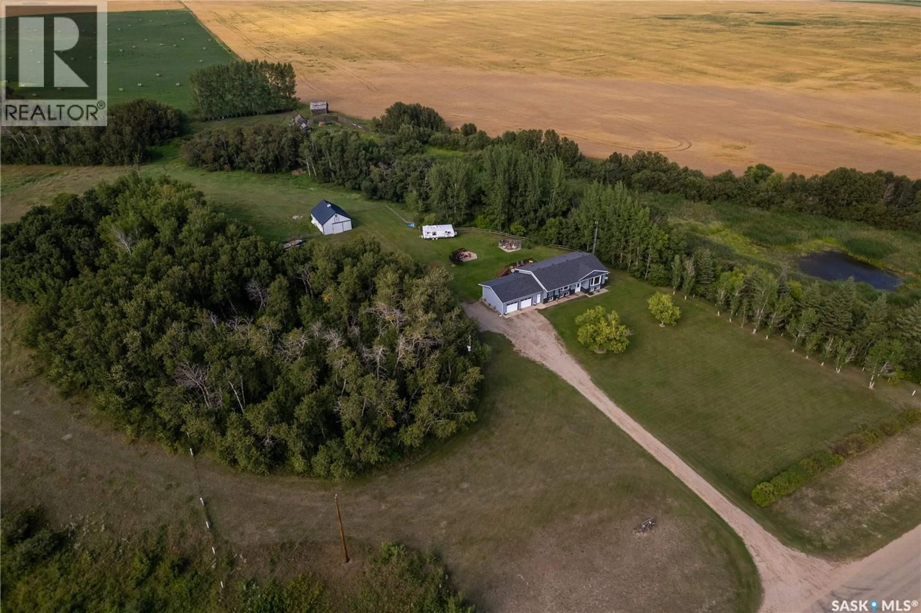A pic from outside/outdoor area/front of a property/back of a property/a pic from drone, water/lake/river/ocean view for CLARK ACREAGE, Spy Hill Rm No. 152 Saskatchewan S0A3W0