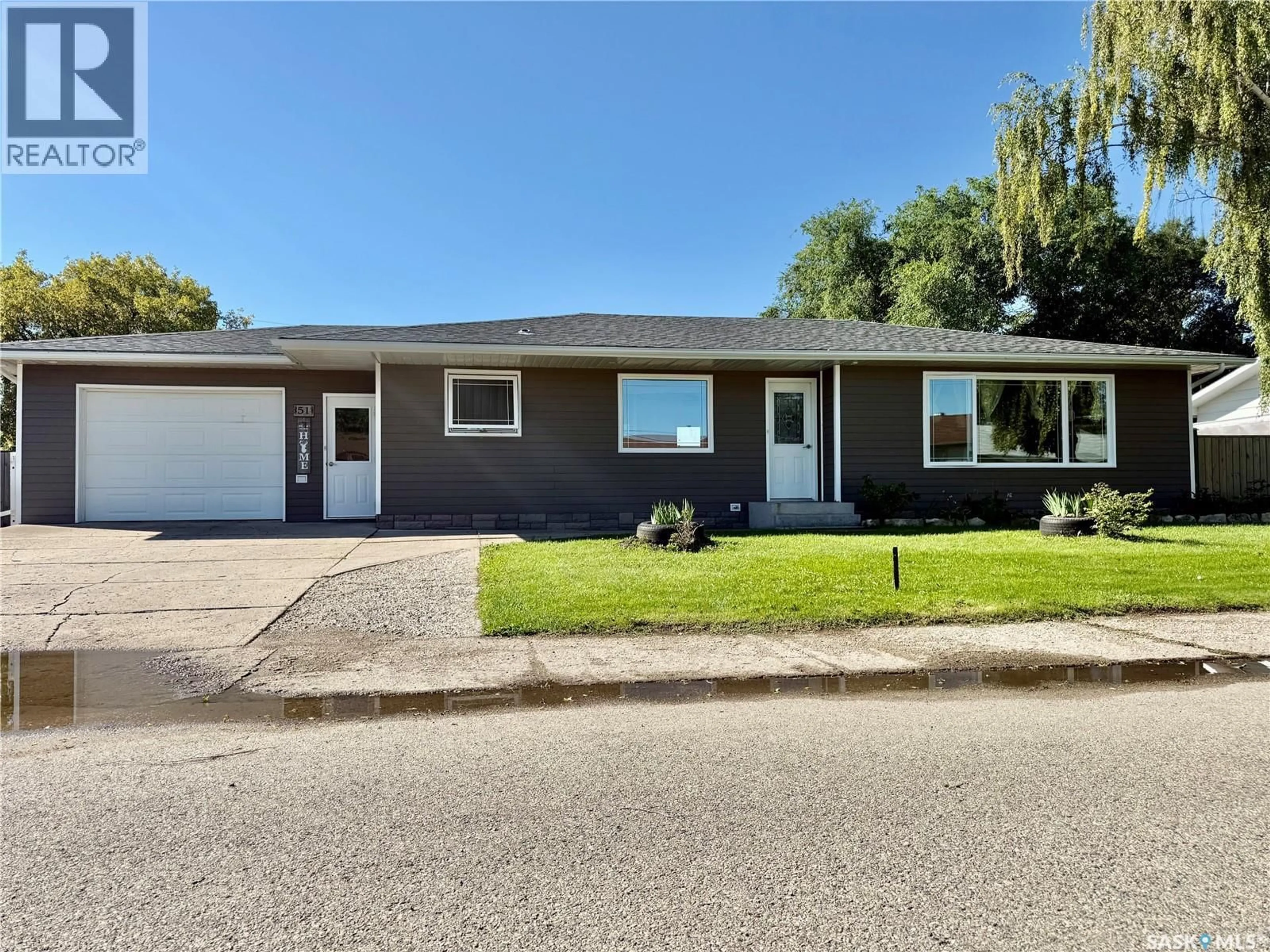 Home with vinyl exterior material, street for 51 KING CRESCENT, Humboldt Saskatchewan S0K2A0