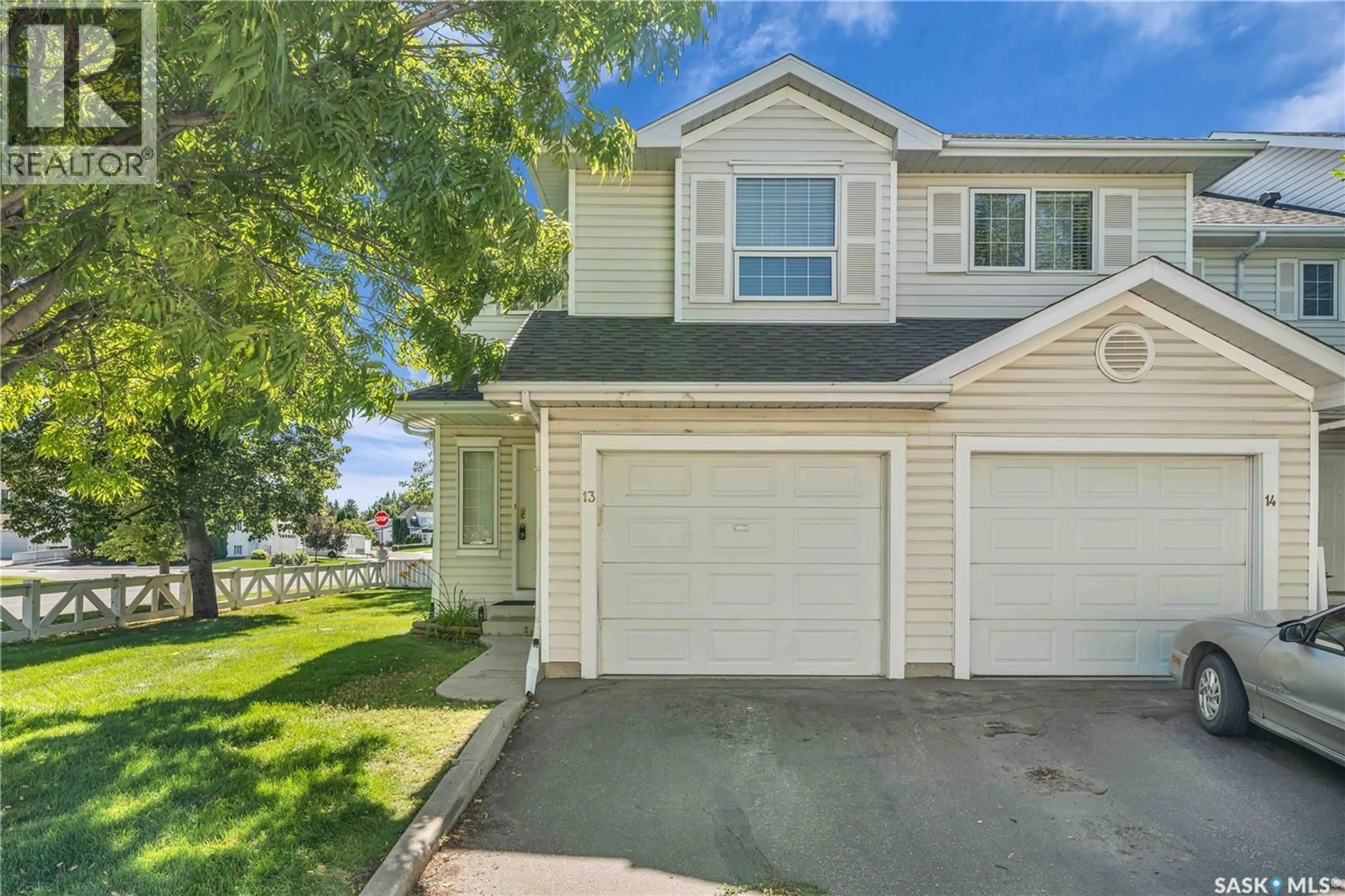 Home with vinyl exterior material, street for 13 110 KEEVIL CRESCENT, Saskatoon Saskatchewan S7N4N8