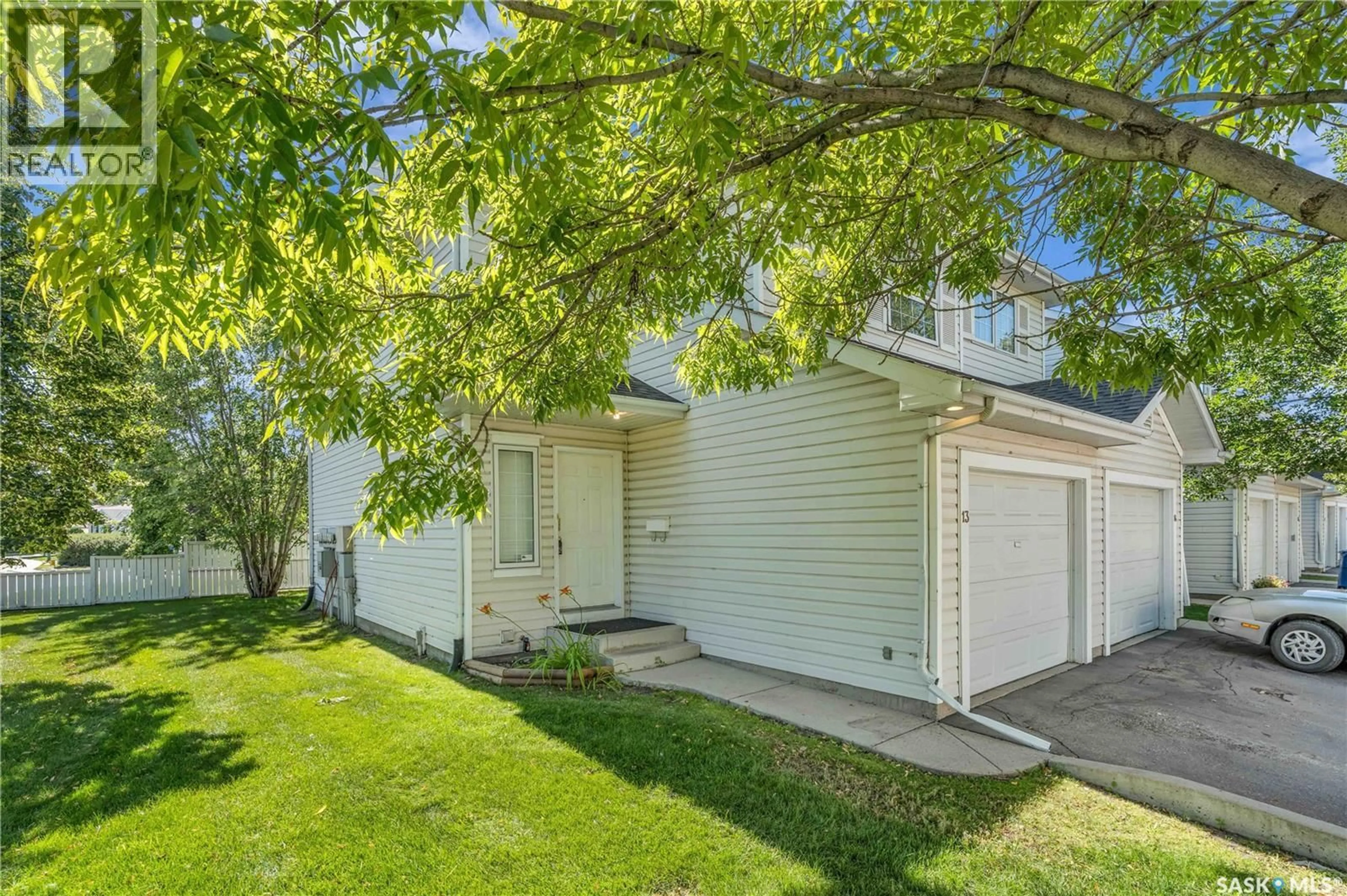 Home with vinyl exterior material, street for 13 110 KEEVIL CRESCENT, Saskatoon Saskatchewan S7N4N8
