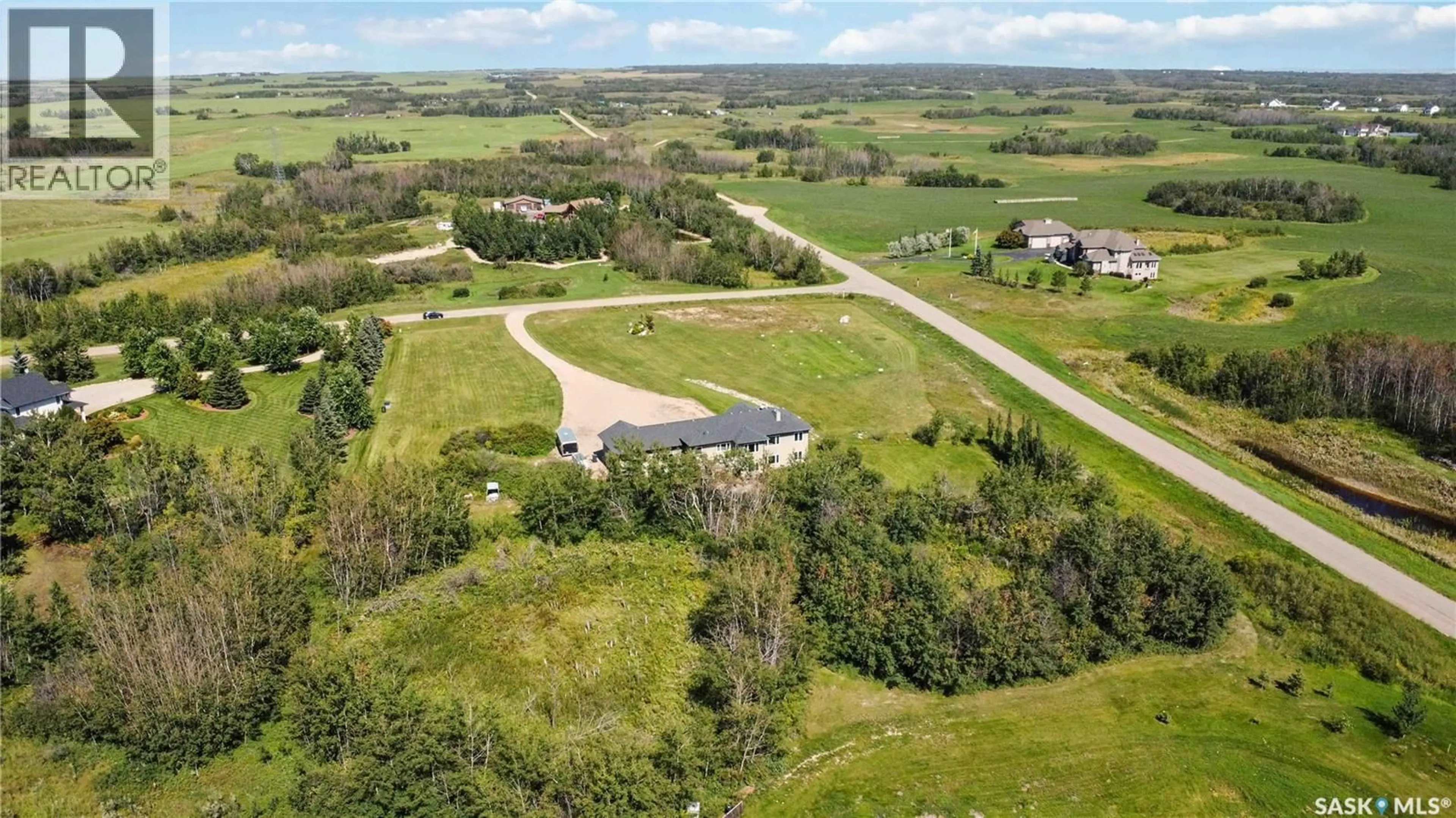 A pic from outside/outdoor area/front of a property/back of a property/a pic from drone, building for 26 HIDDEN RIDGE BEND, Corman Park Rm No. 344 Saskatchewan S0K0Y0