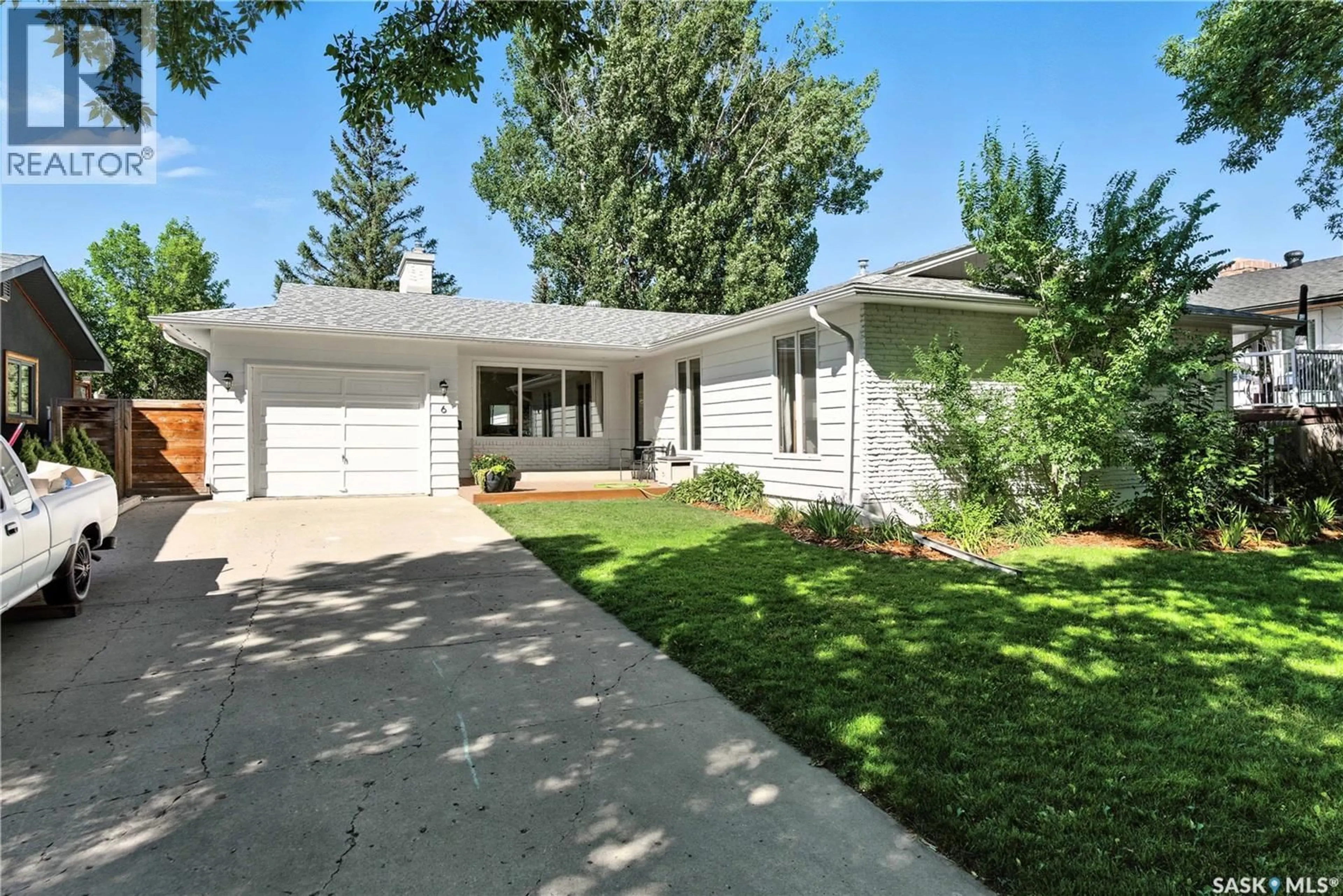Home with vinyl exterior material, street for 6 WILKIE ROAD, Regina Saskatchewan S4S5Y2