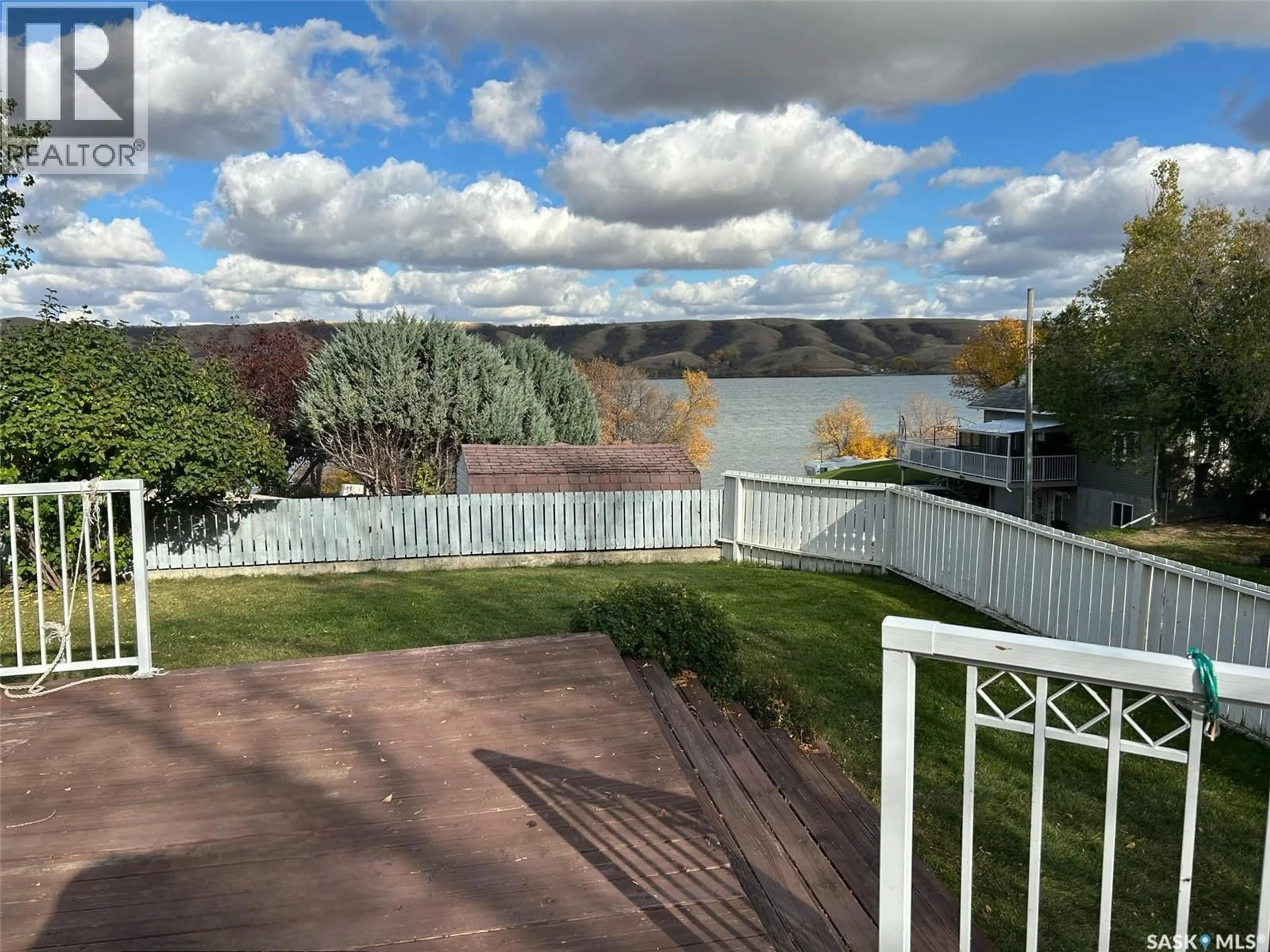 A pic from outside/outdoor area/front of a property/back of a property/a pic from drone, water/lake/river/ocean view for 114 MARINE DRIVE, South Lake Saskatchewan S0H2X0