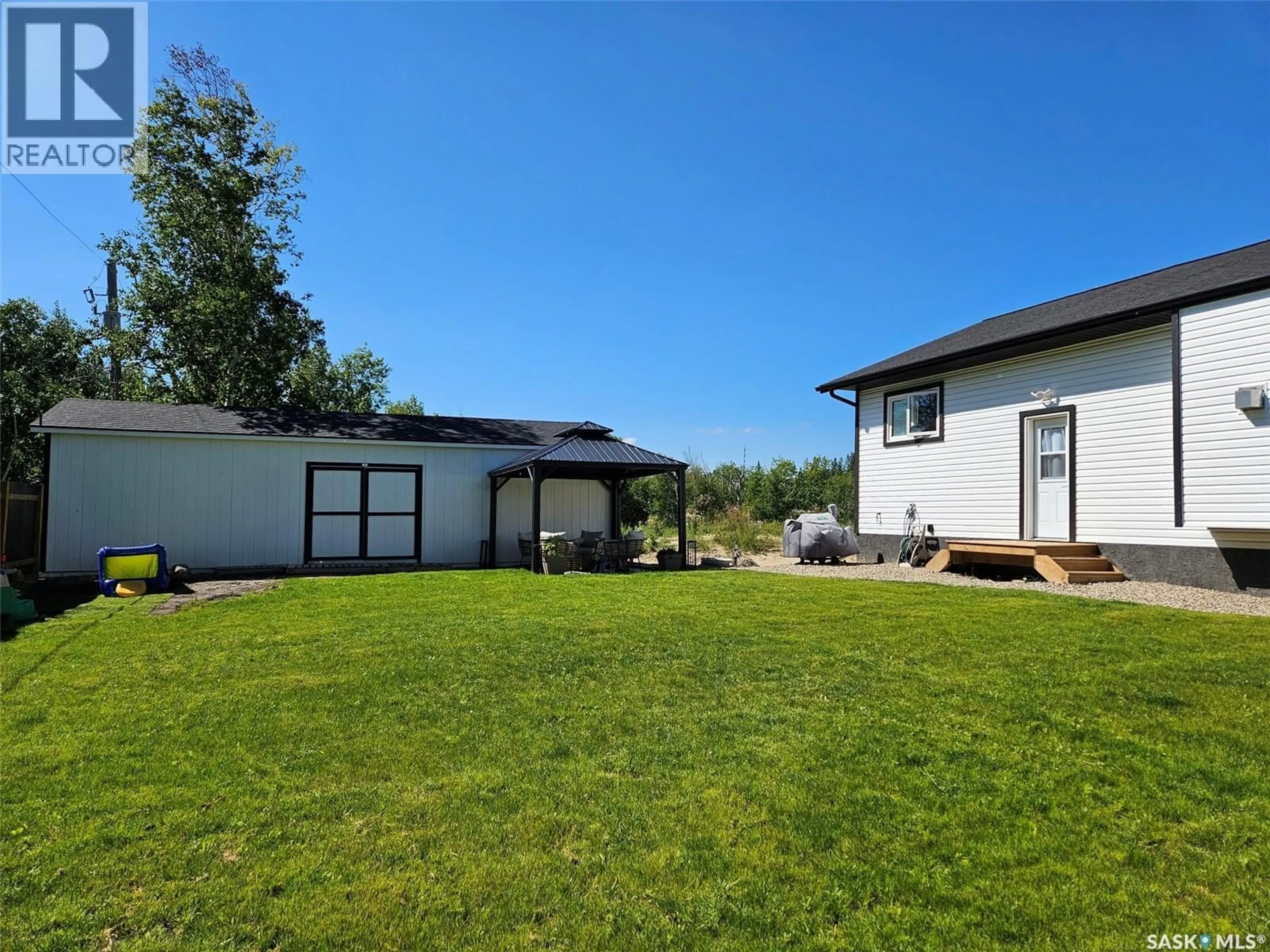 A pic from outside/outdoor area/front of a property/back of a property/a pic from drone, unknown for 1 MOKI BAY, Kenosee Lake Saskatchewan S0C2S0