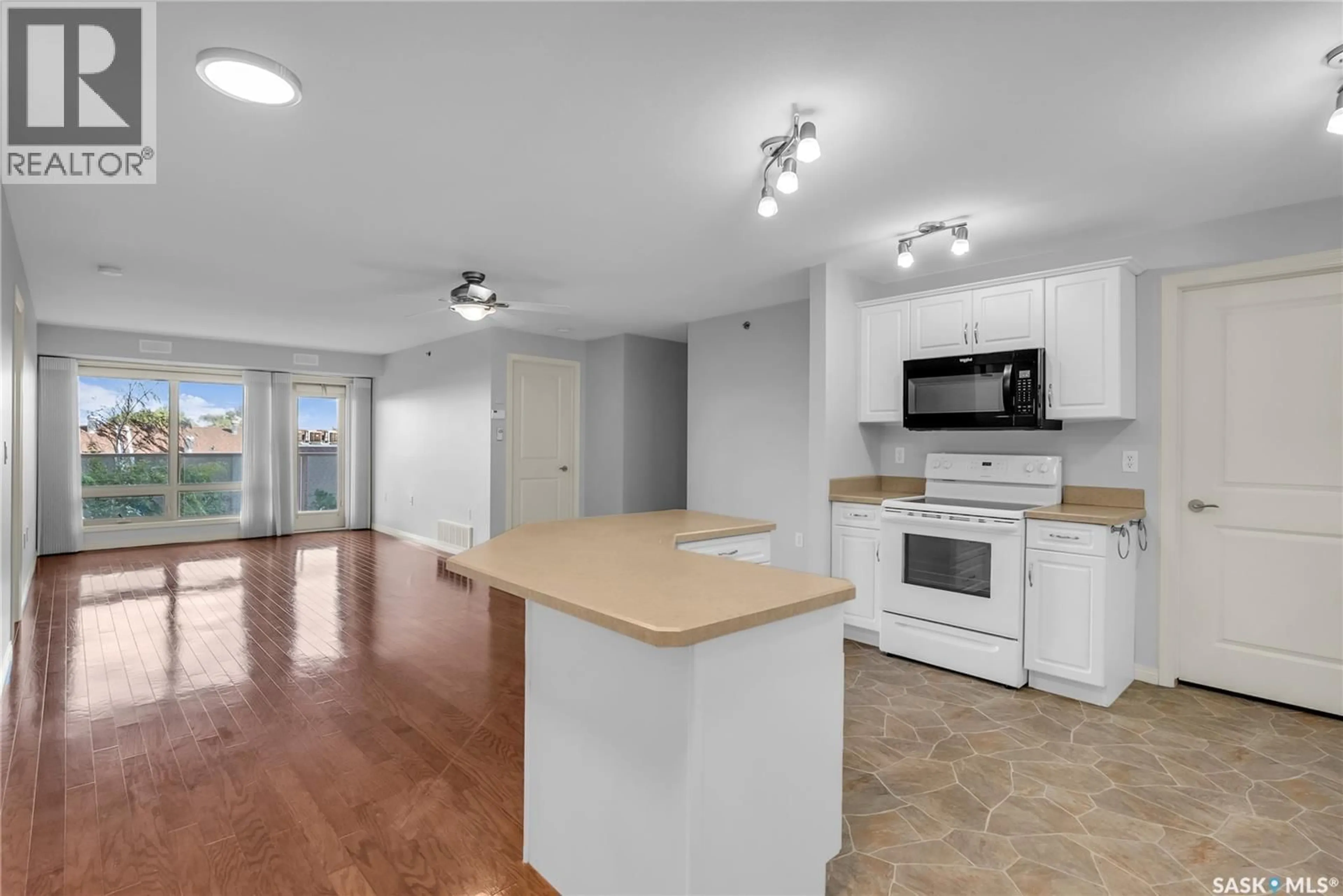 Open concept kitchen, unknown for 506 - 2221 ADELAIDE STREET, Saskatoon Saskatchewan S7J5L9
