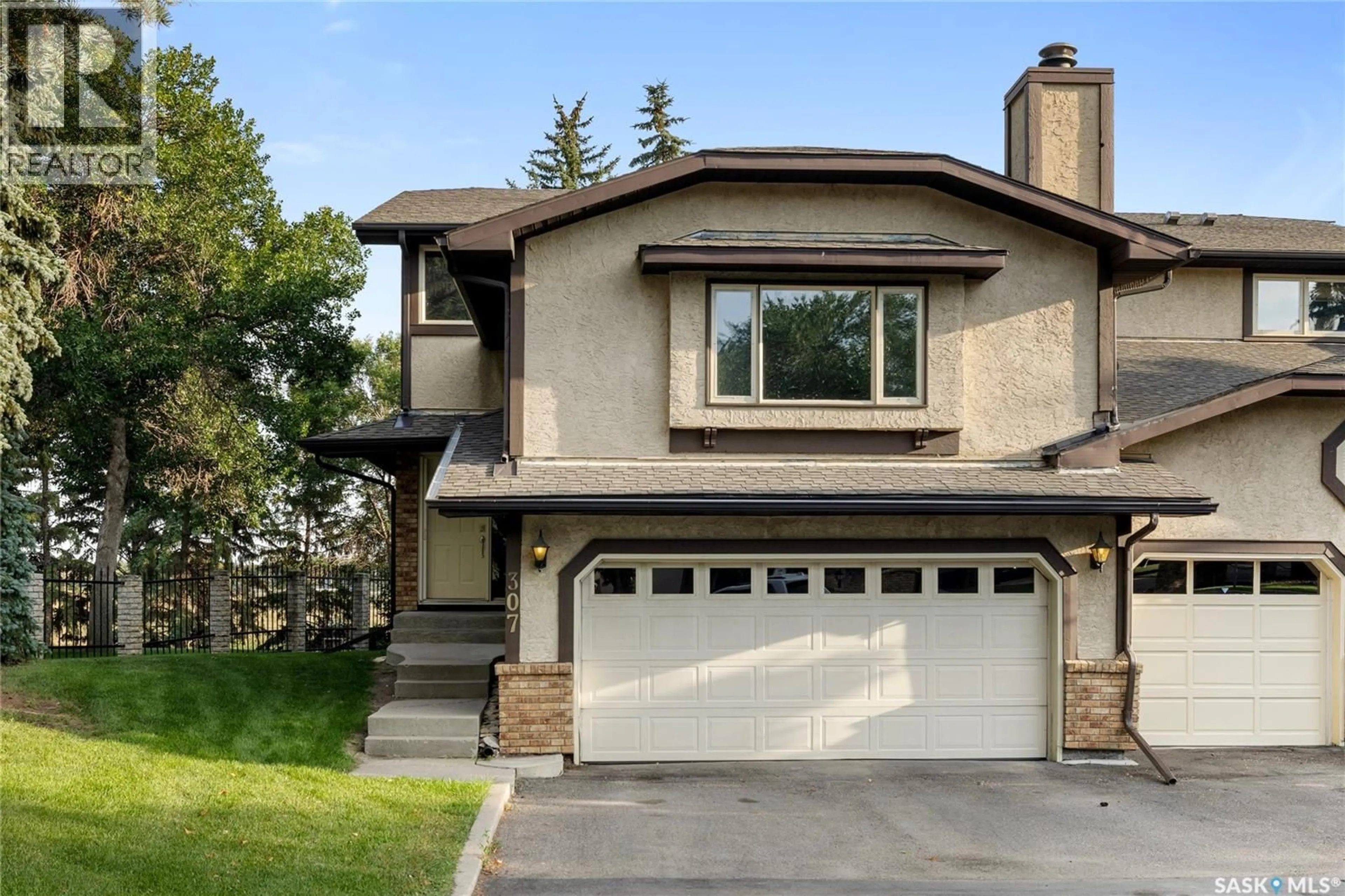 Home with vinyl exterior material, street for 307 AVON DRIVE, Regina Saskatchewan S4V1L8