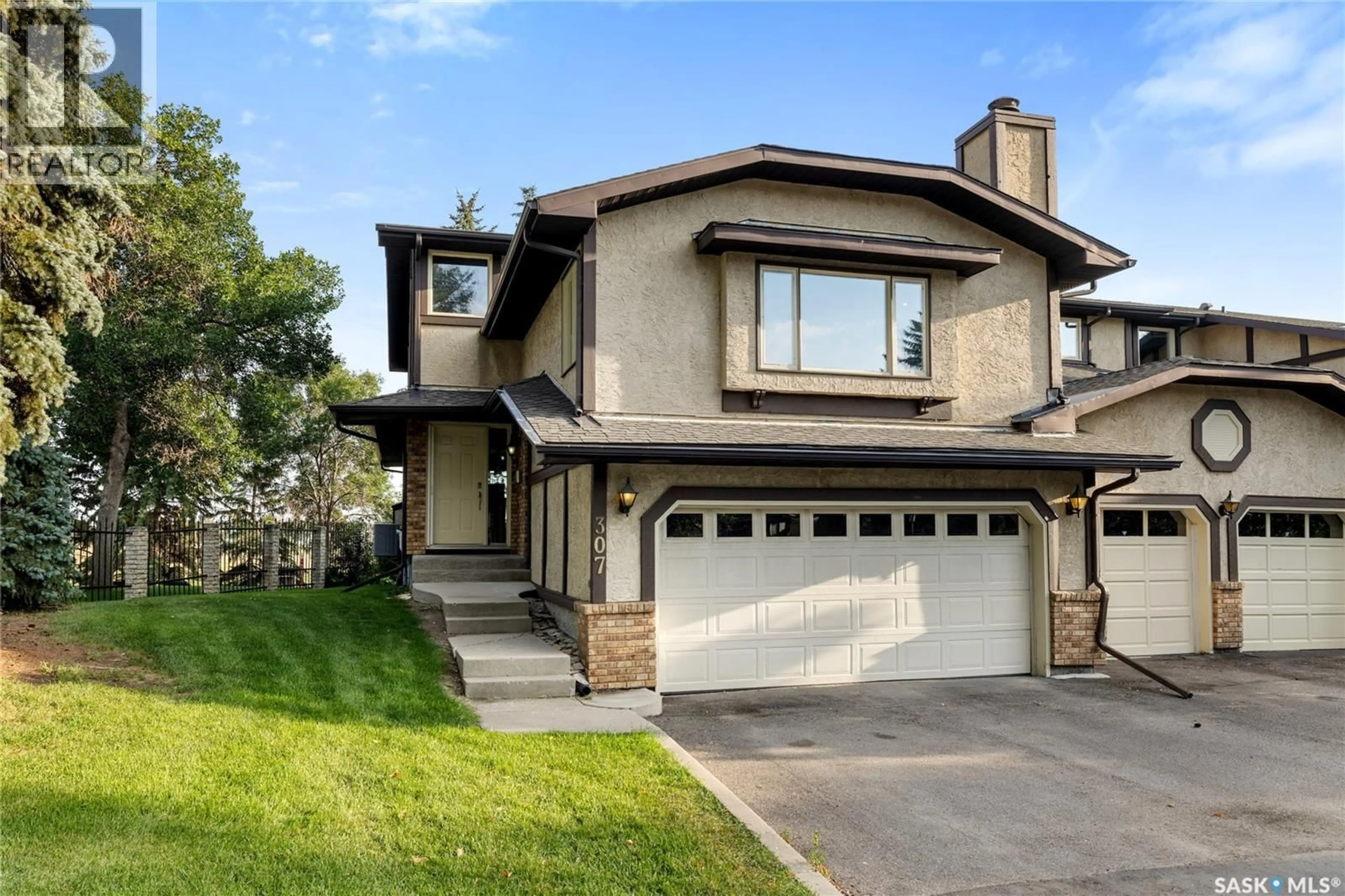 Home with vinyl exterior material, street for 307 AVON DRIVE, Regina Saskatchewan S4V1L8