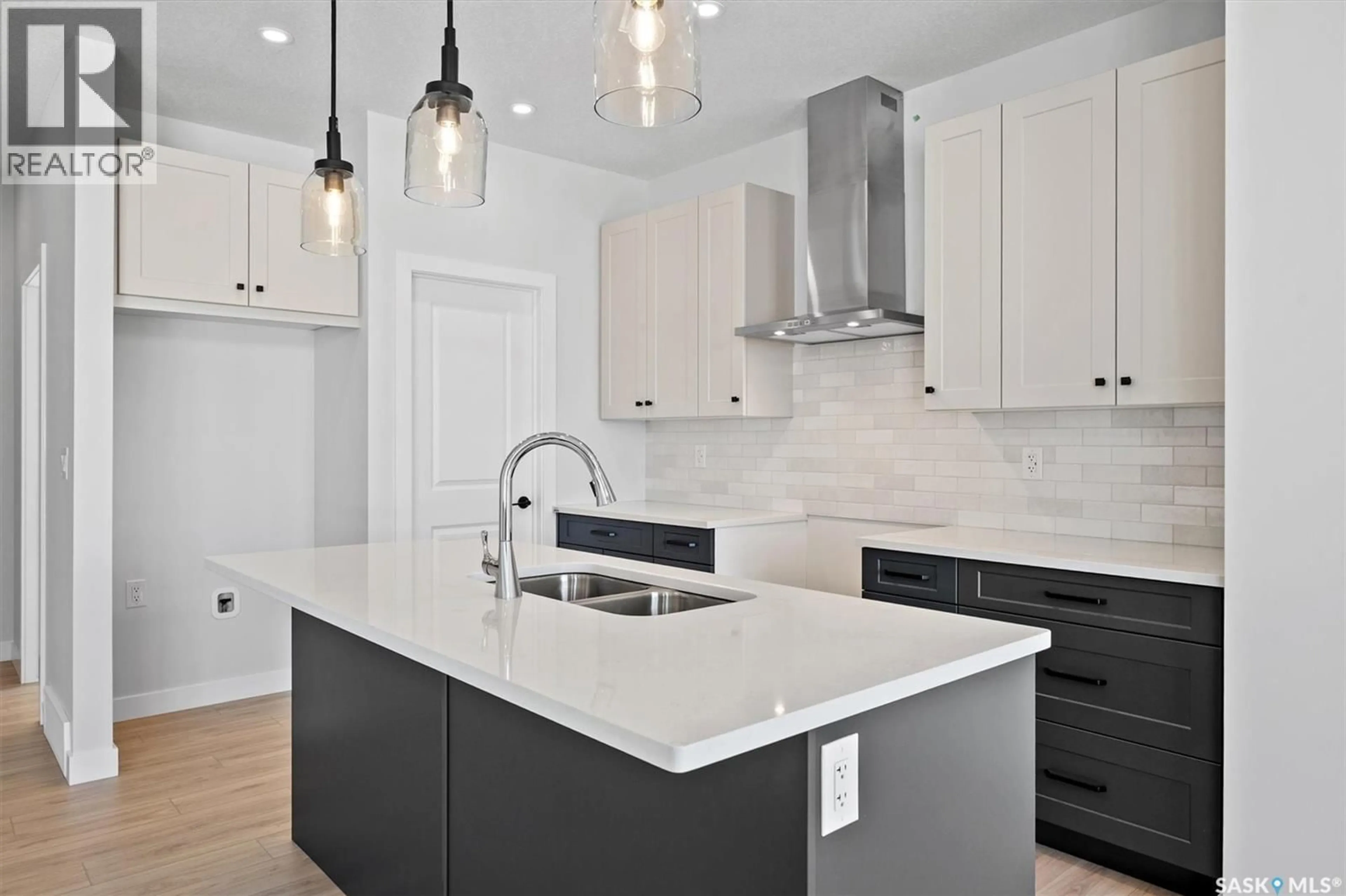 Open concept kitchen, ceramic/tile floor for 204 OLIVER LANE, Martensville Saskatchewan S0K2T1
