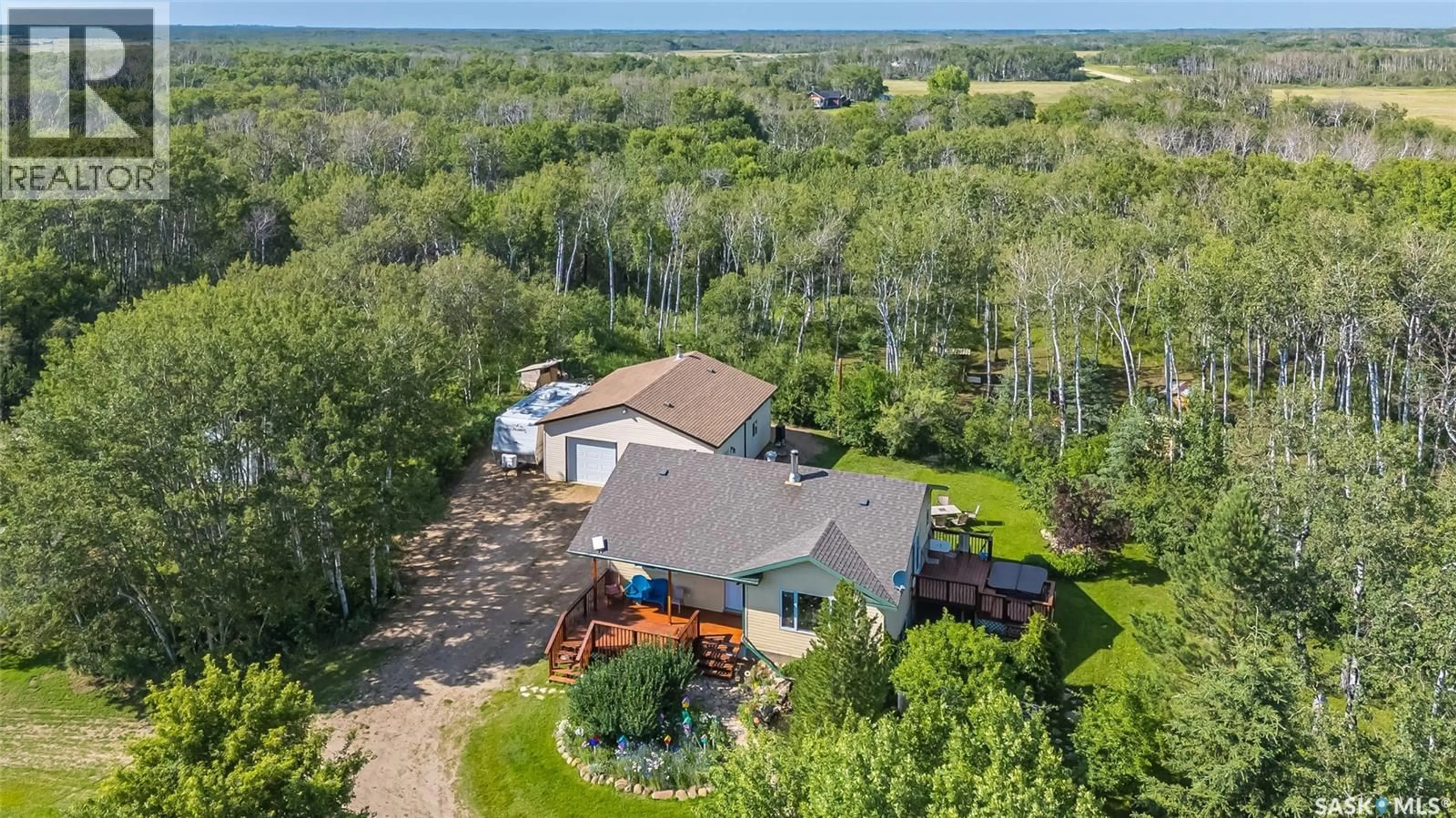 A pic from outside/outdoor area/front of a property/back of a property/a pic from drone, water/lake/river/ocean view for NORTON ACREAGE, Asquith Saskatchewan S0K1V0