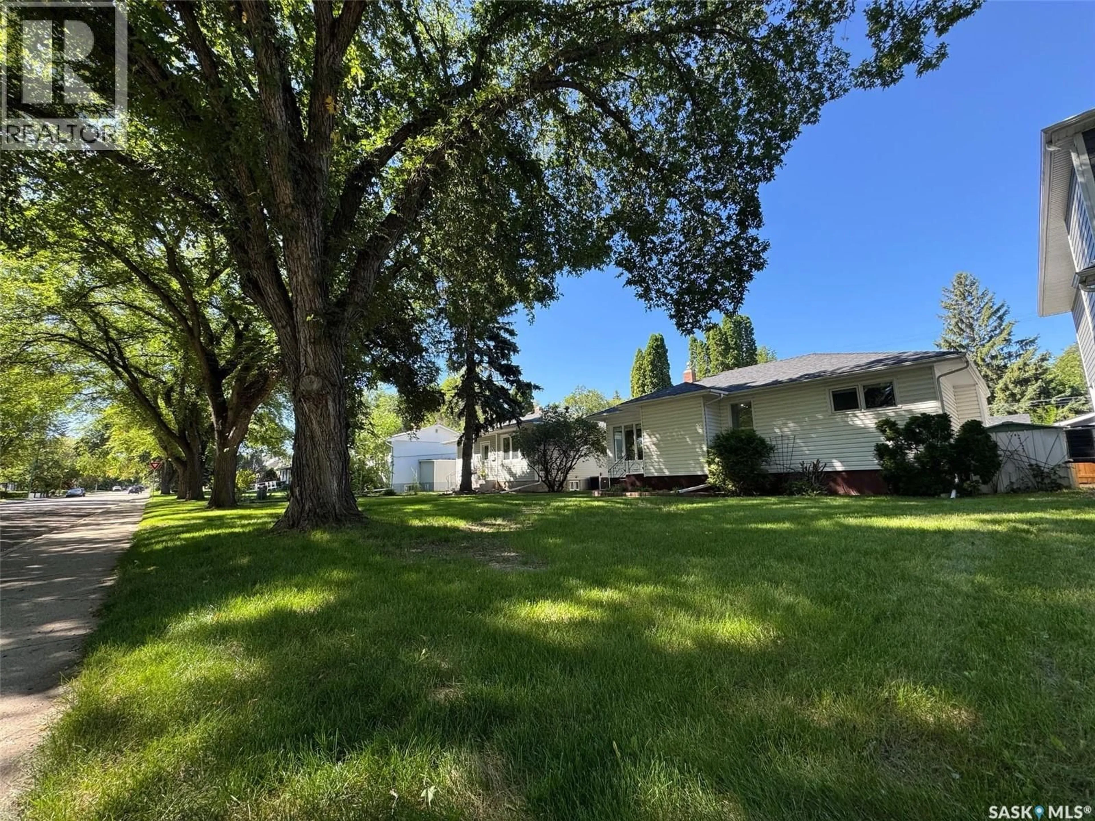 A pic from outside/outdoor area/front of a property/back of a property/a pic from drone, unknown for S - 1406 WIGGINS AVENUE, Saskatoon Saskatchewan S7H2J6