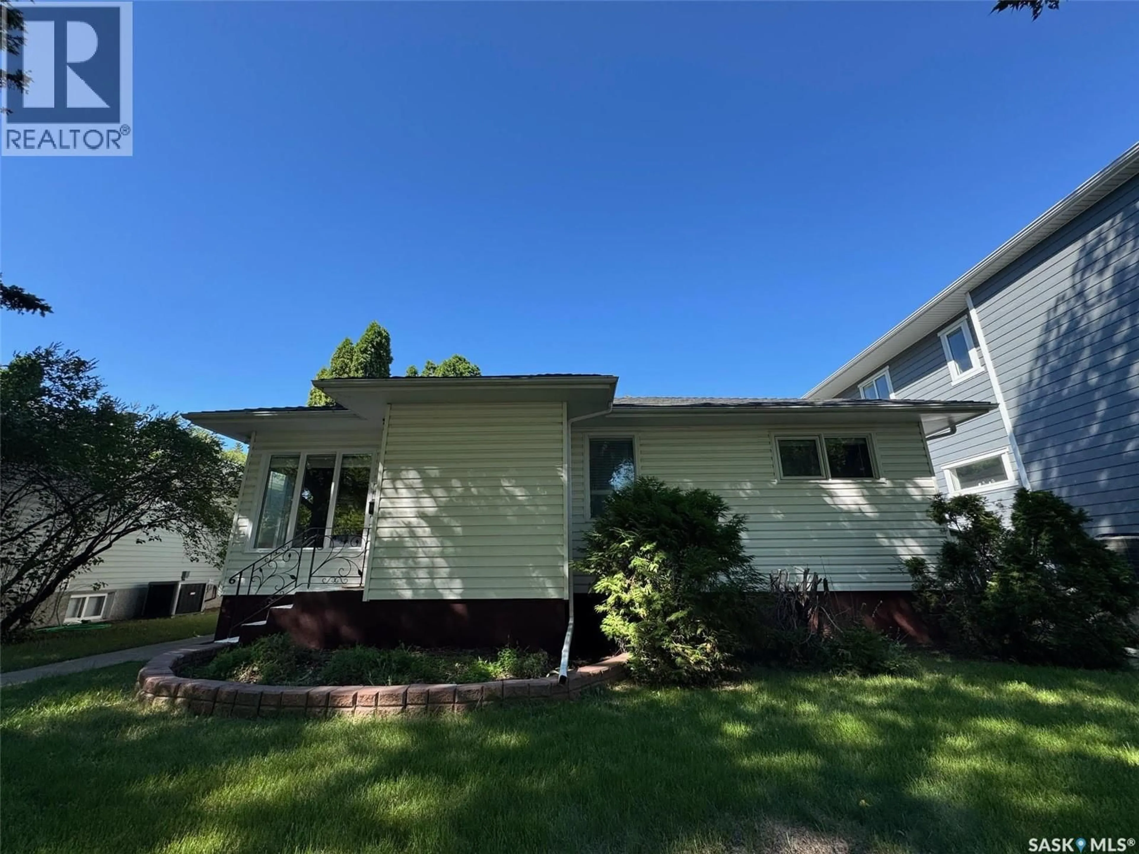Home with vinyl exterior material, street for S - 1406 WIGGINS AVENUE, Saskatoon Saskatchewan S7H2J6