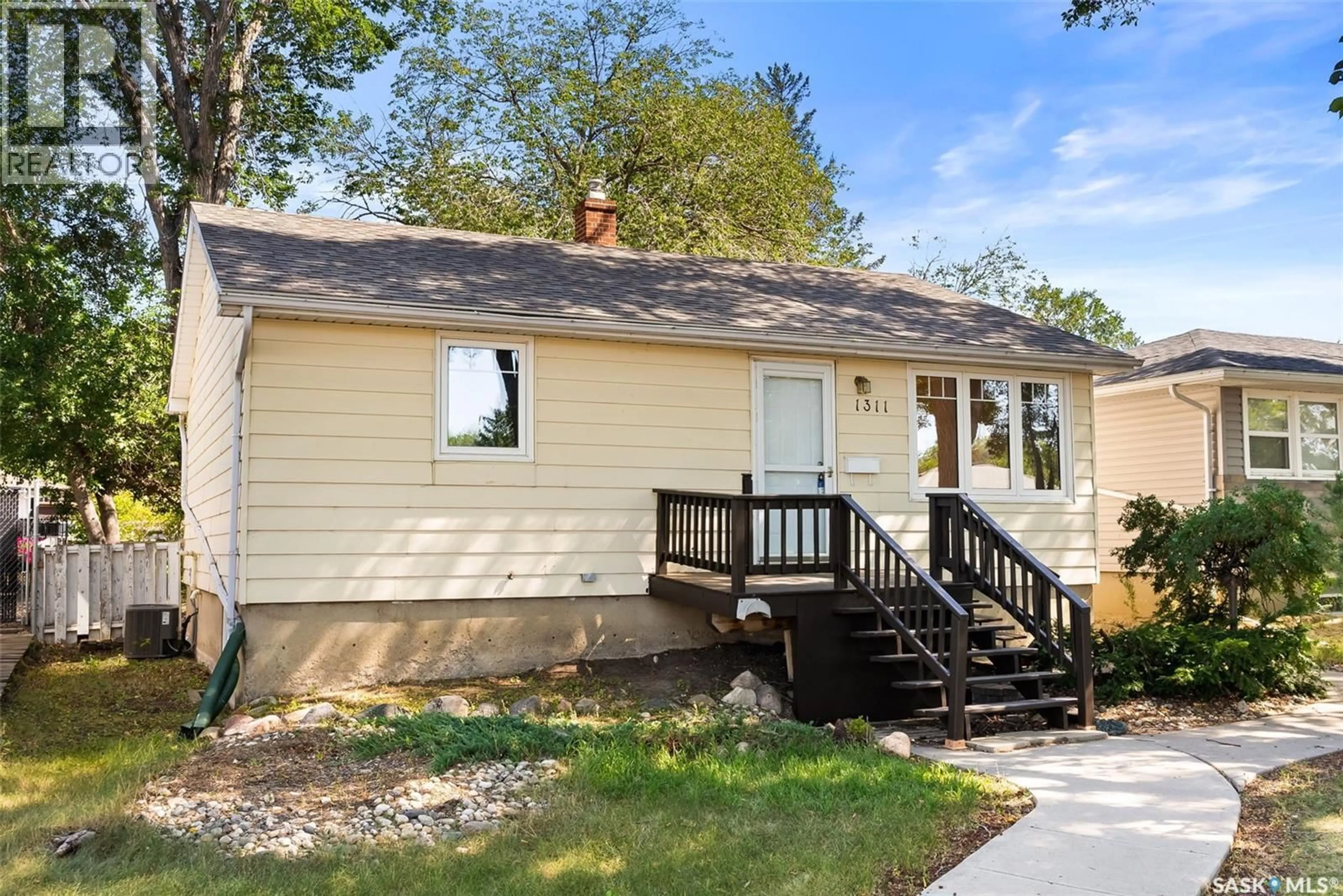 Home with vinyl exterior material, street for 1311 HORACE STREET, Regina Saskatchewan S4T5L7