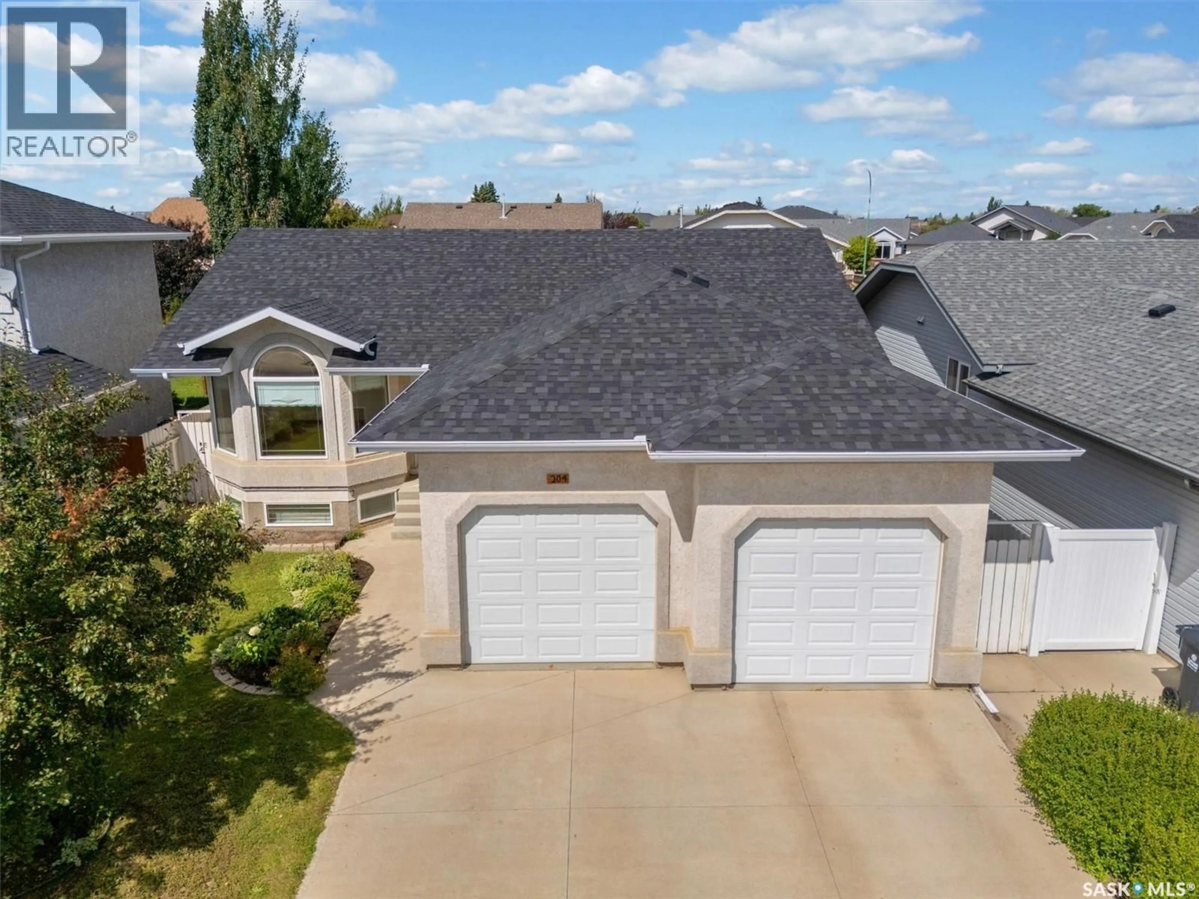 A pic from outside/outdoor area/front of a property/back of a property/a pic from drone, street for 204 BURKE PLACE, Warman Saskatchewan S0K0A1