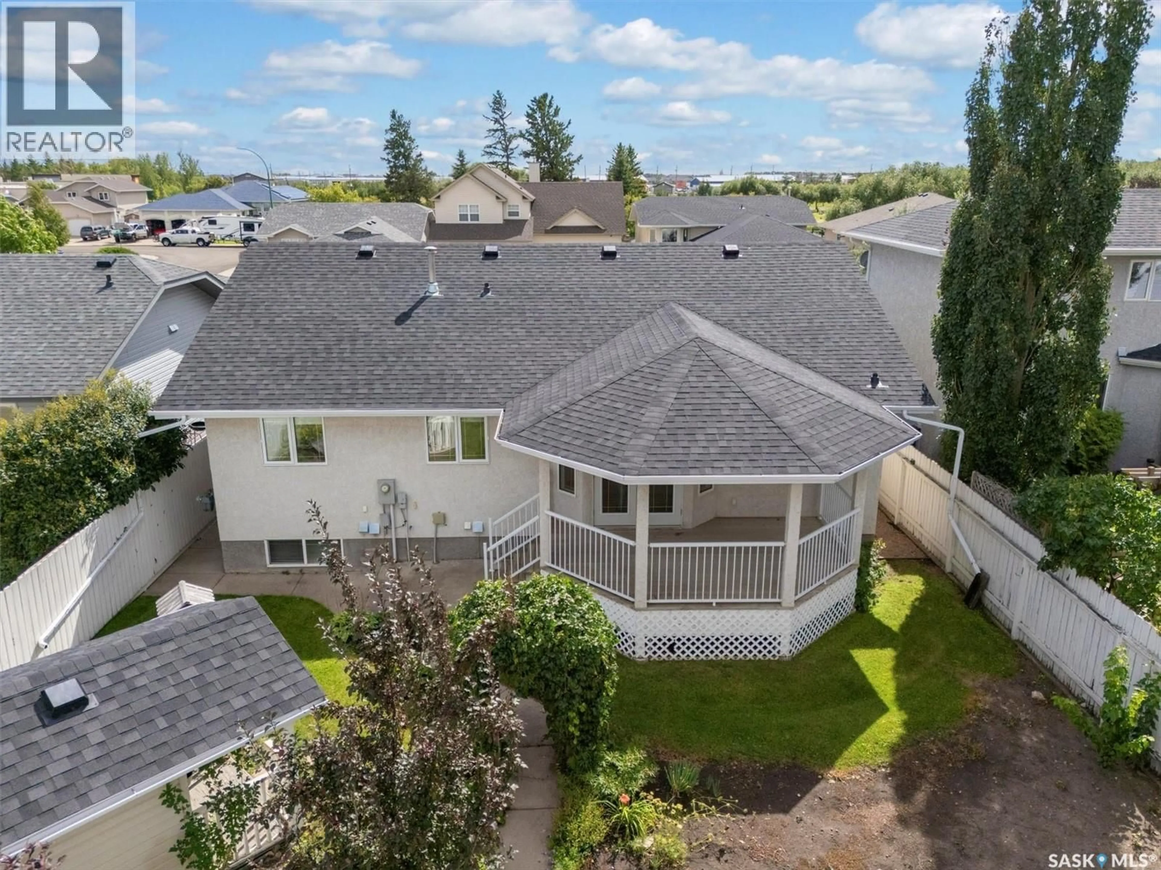 A pic from outside/outdoor area/front of a property/back of a property/a pic from drone, unknown for 204 BURKE PLACE, Warman Saskatchewan S0K0A1